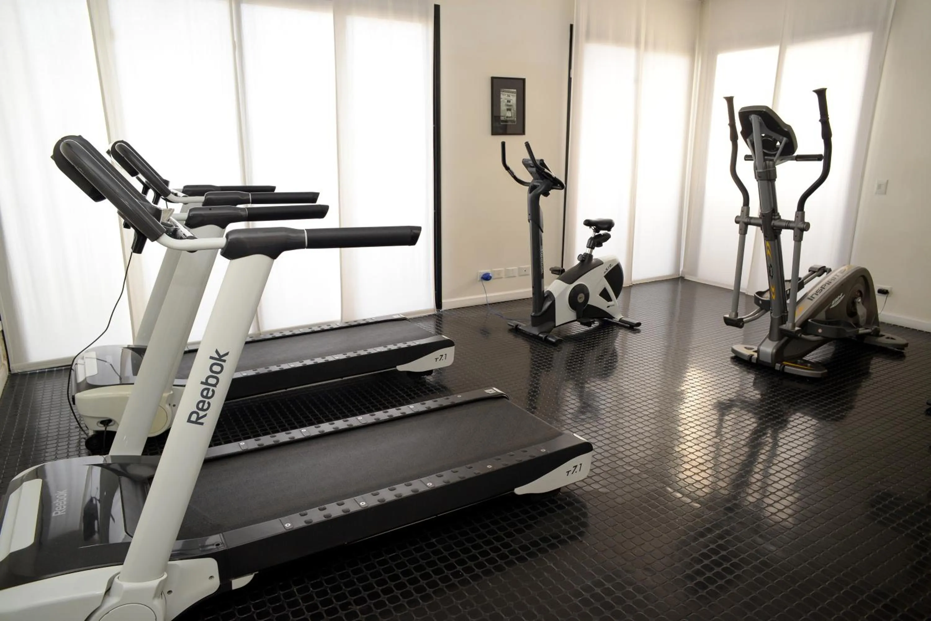Fitness centre/facilities in IQ Callao By Recoleta Apartments