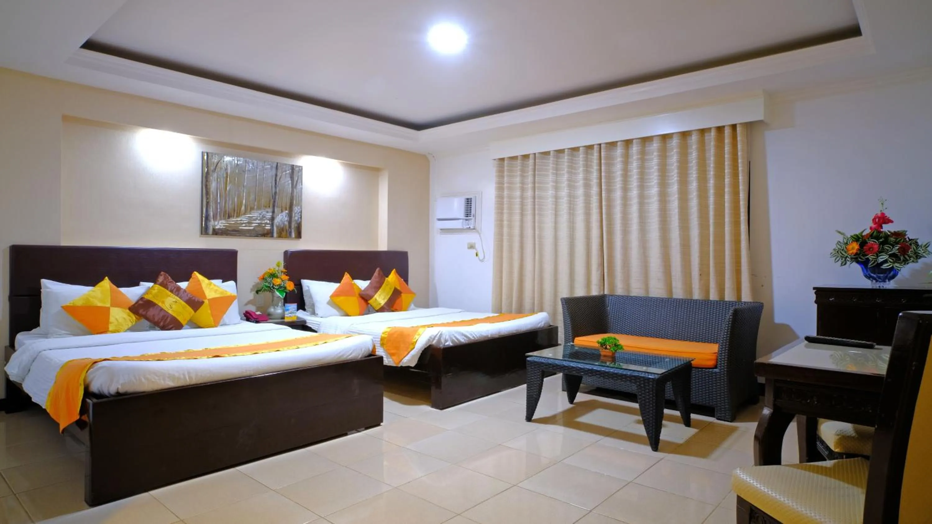 Living room, Bed in Boracay Holiday Resort
