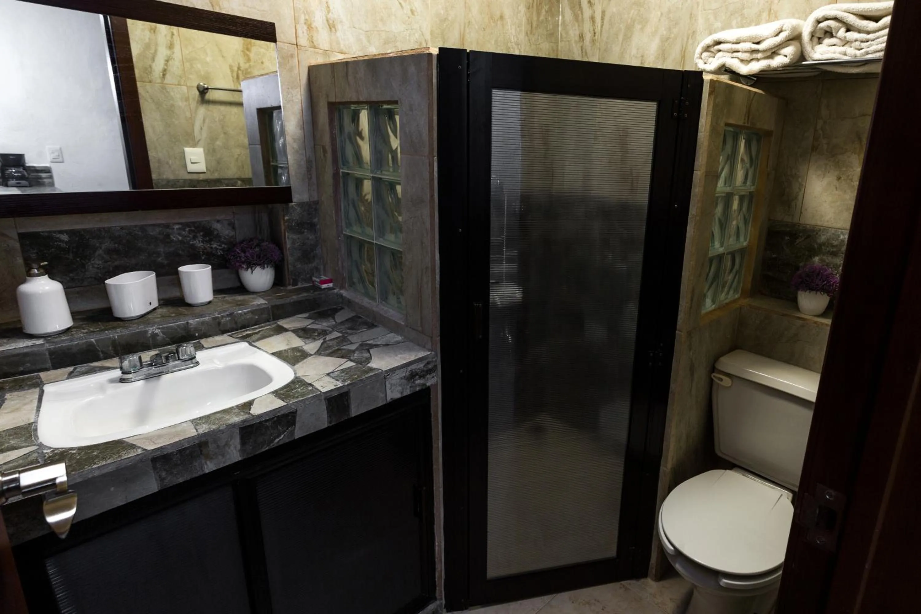 Toilet in Merida Serviced Apartments