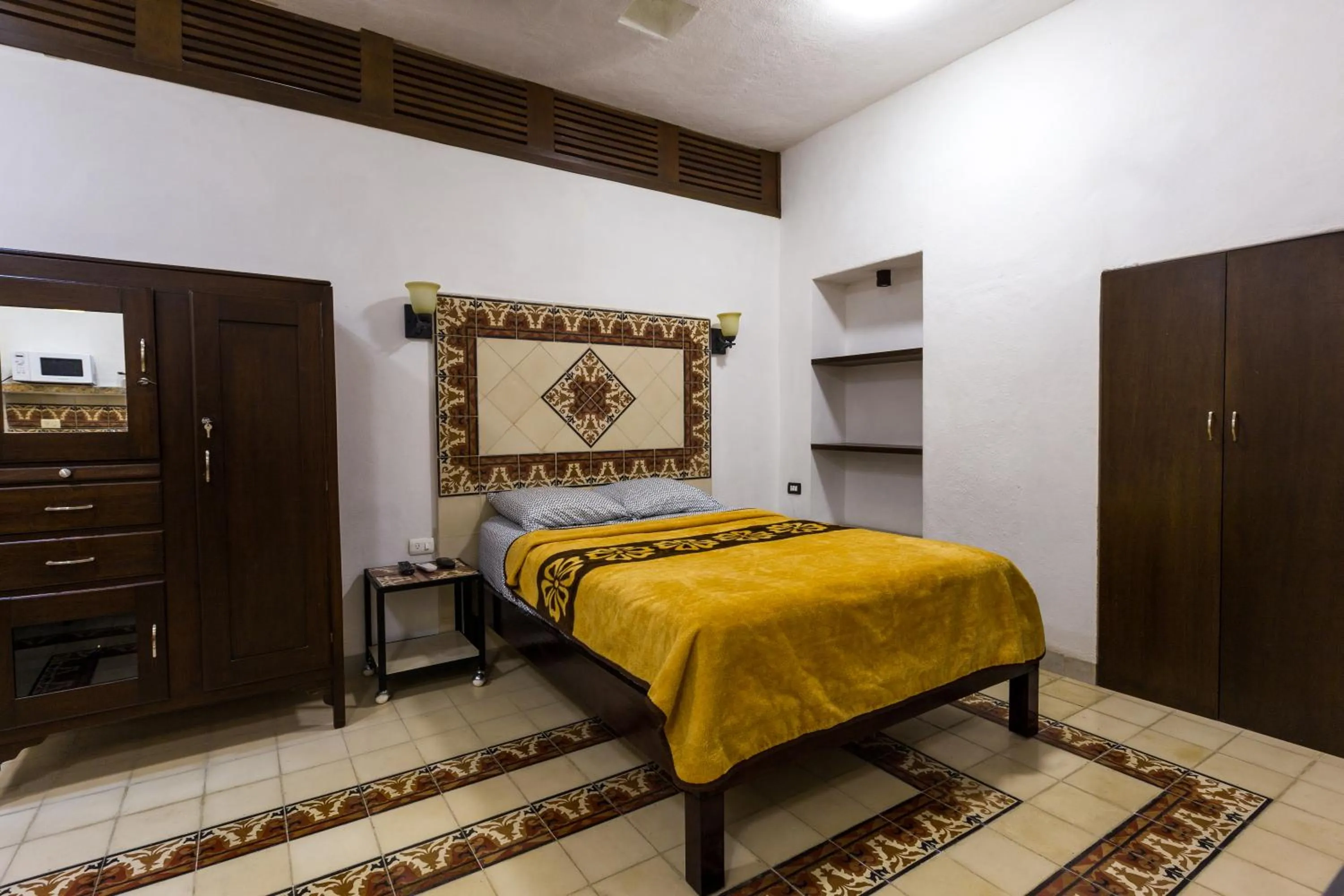 Bed in Merida Serviced Apartments