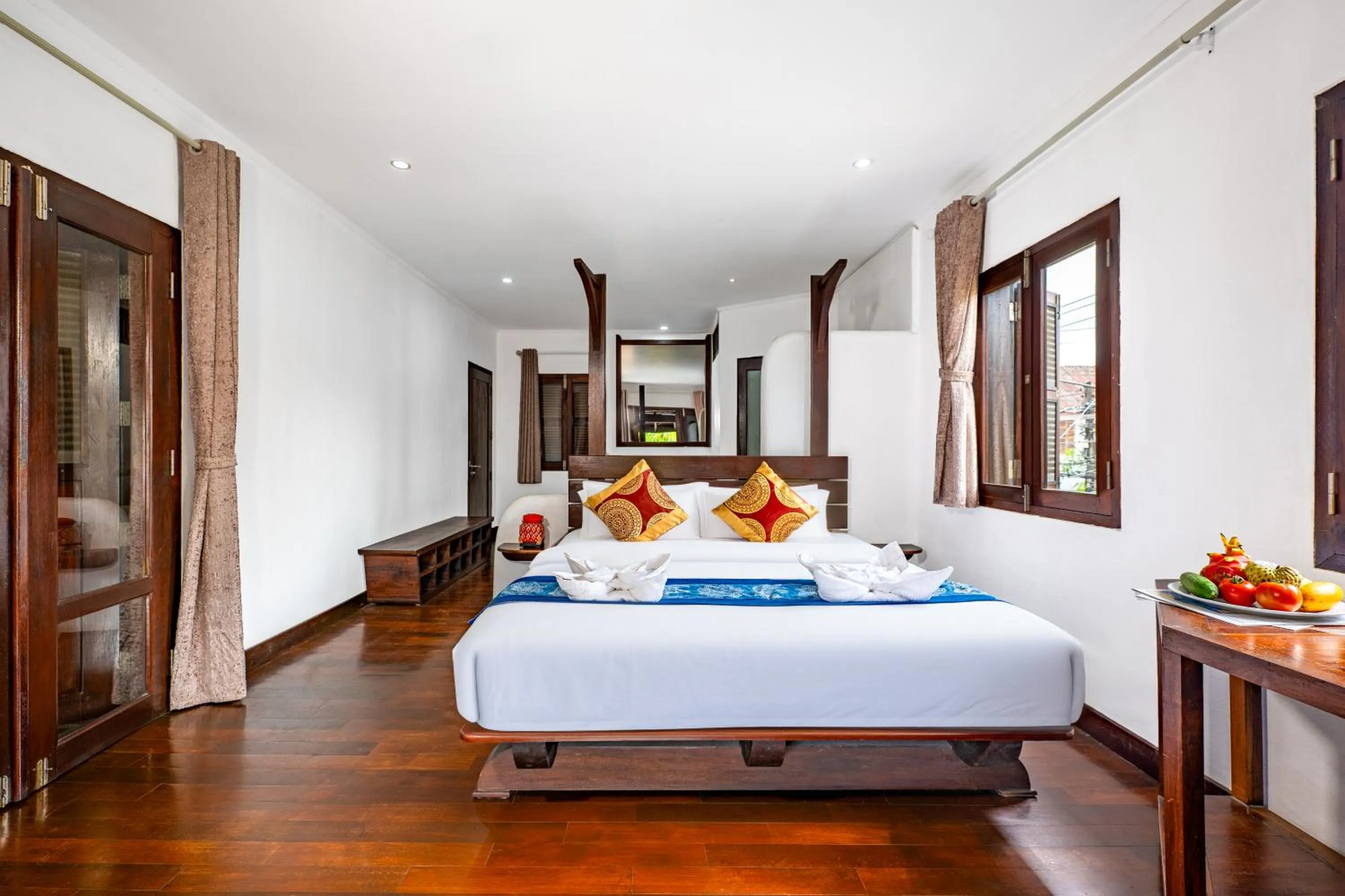 Bed in Ancient Luangprabang Hotel