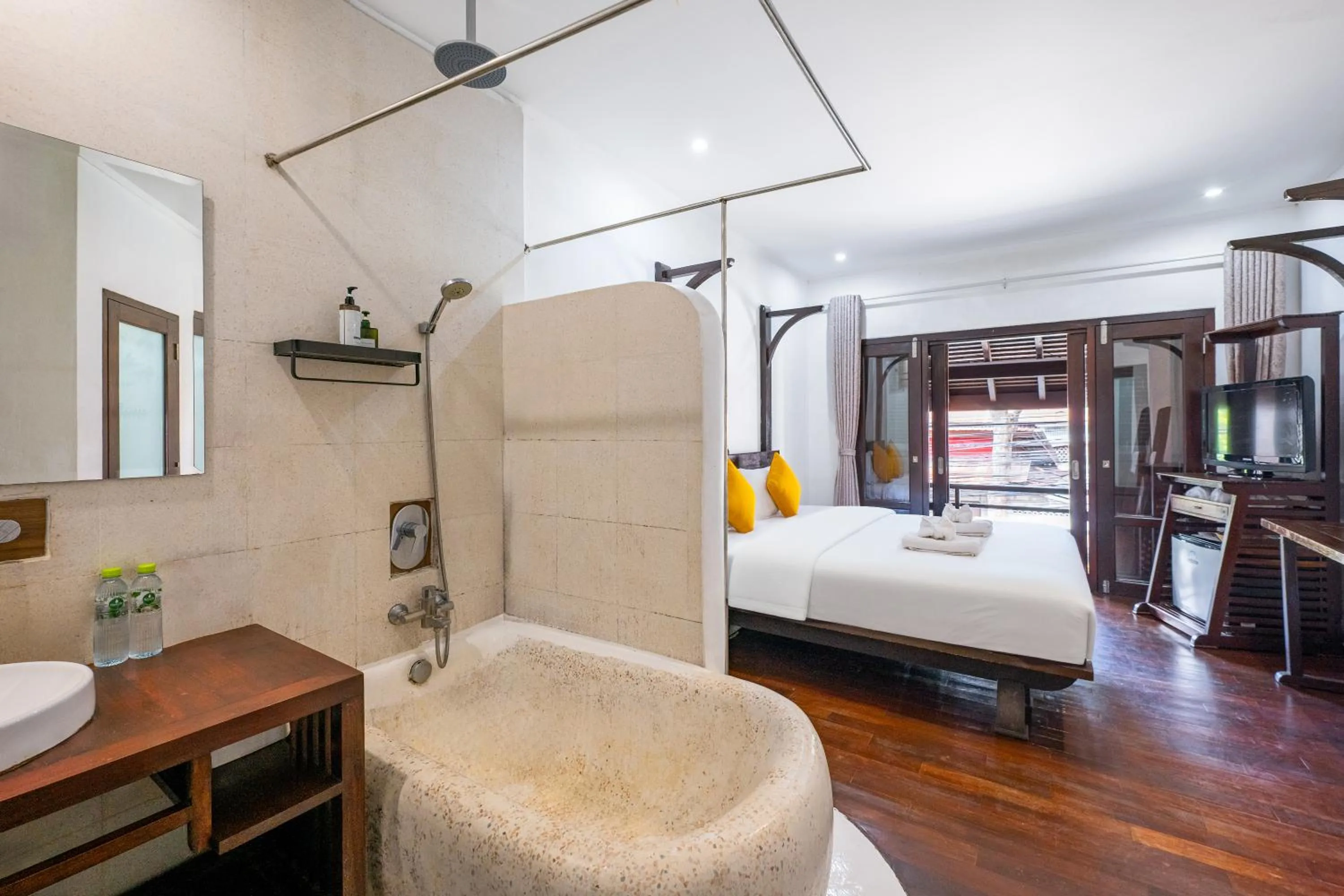 Bed in Ancient Luangprabang Hotel