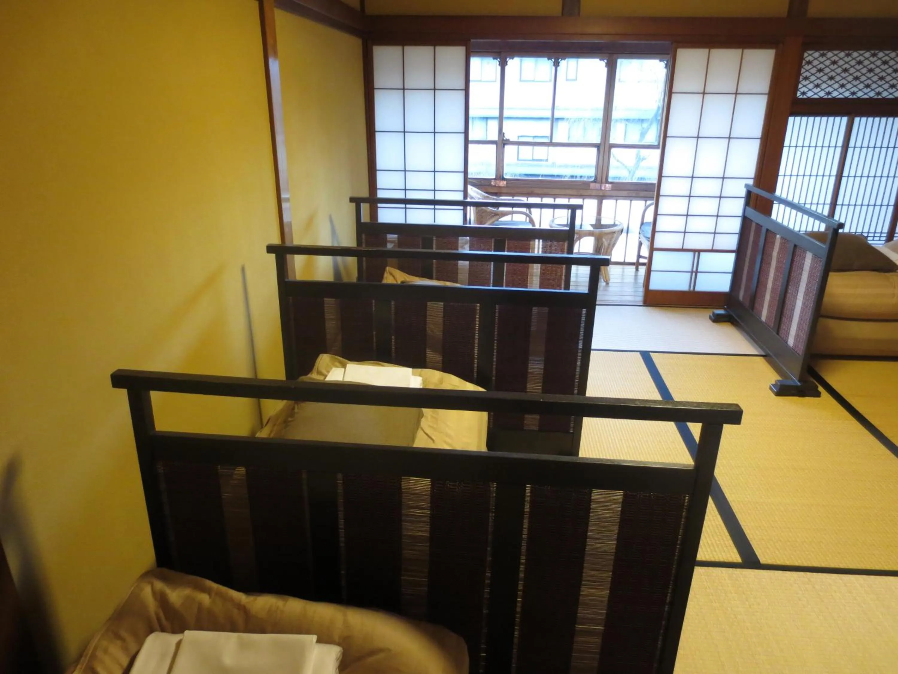 Bed in K's House Ito Onsen - Historical Ryokan Hostel