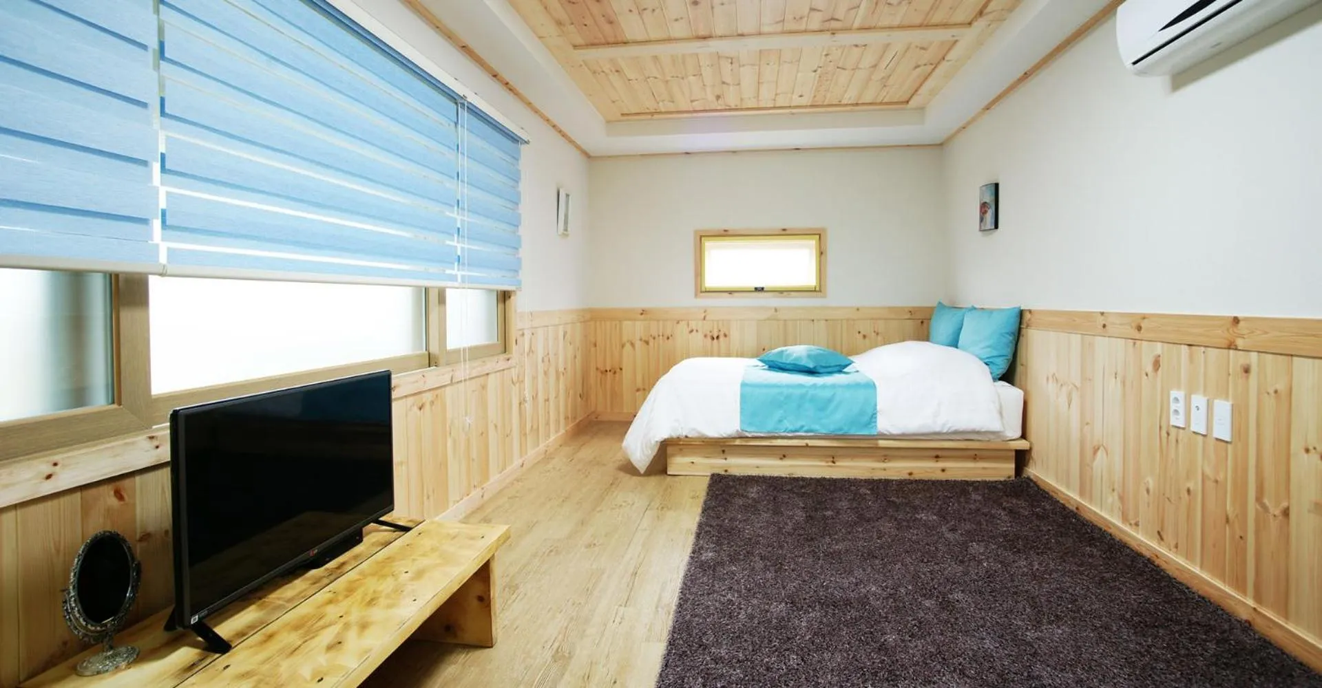 Bed in Gotjawal Geomunoreum Pension