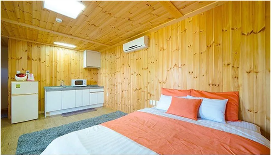 Bed in Gotjawal Geomunoreum Pension