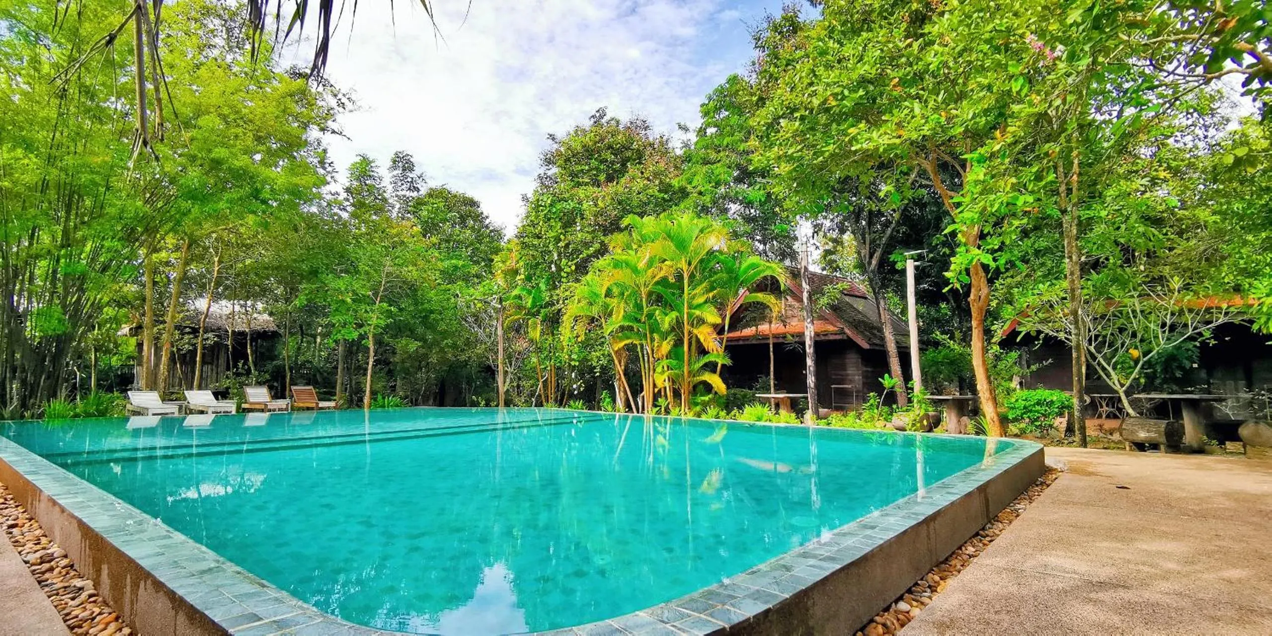 Swimming pool in Palm Village Resort & Spa