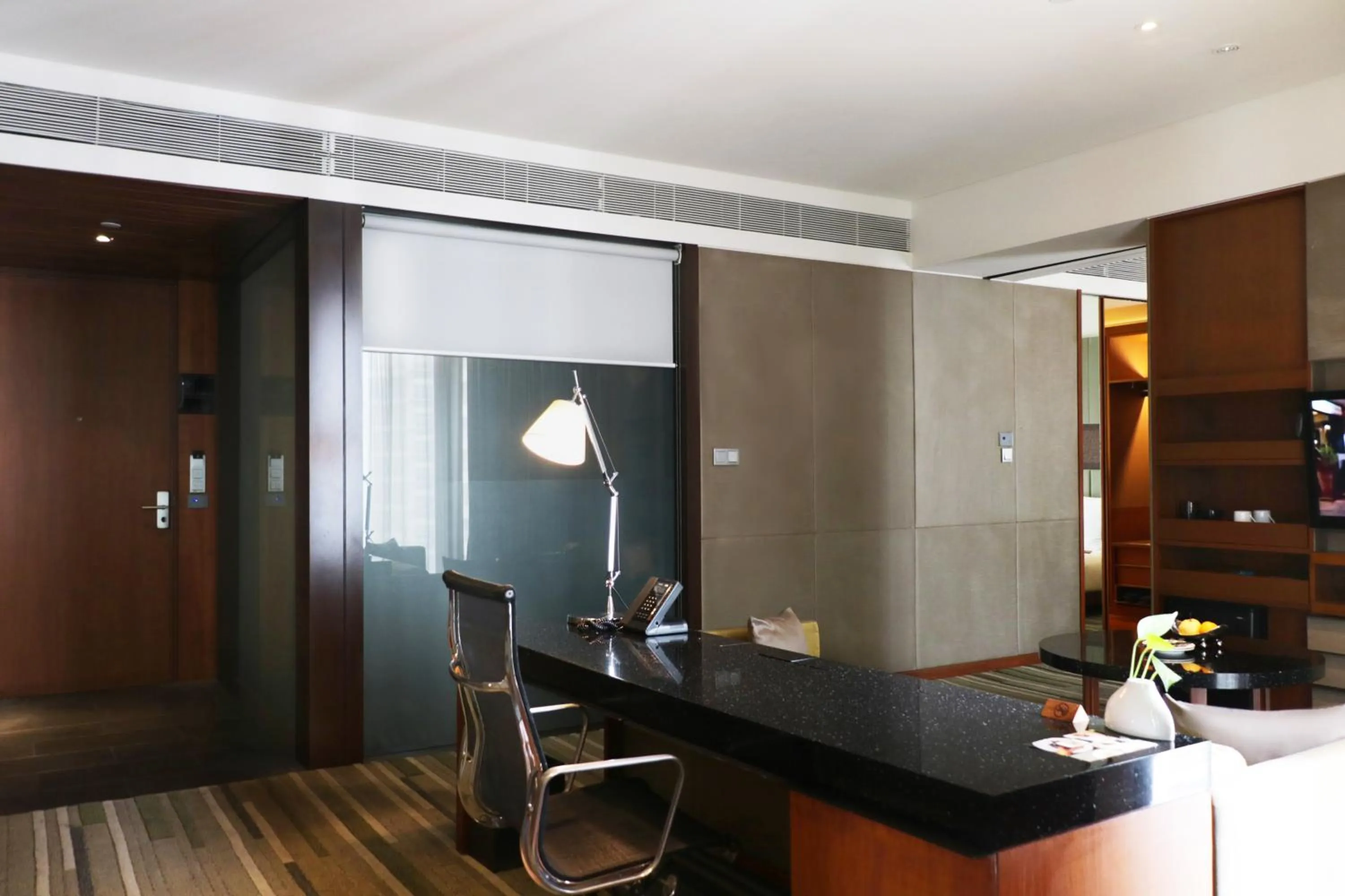 Living room in Hansar Bangkok Hotel