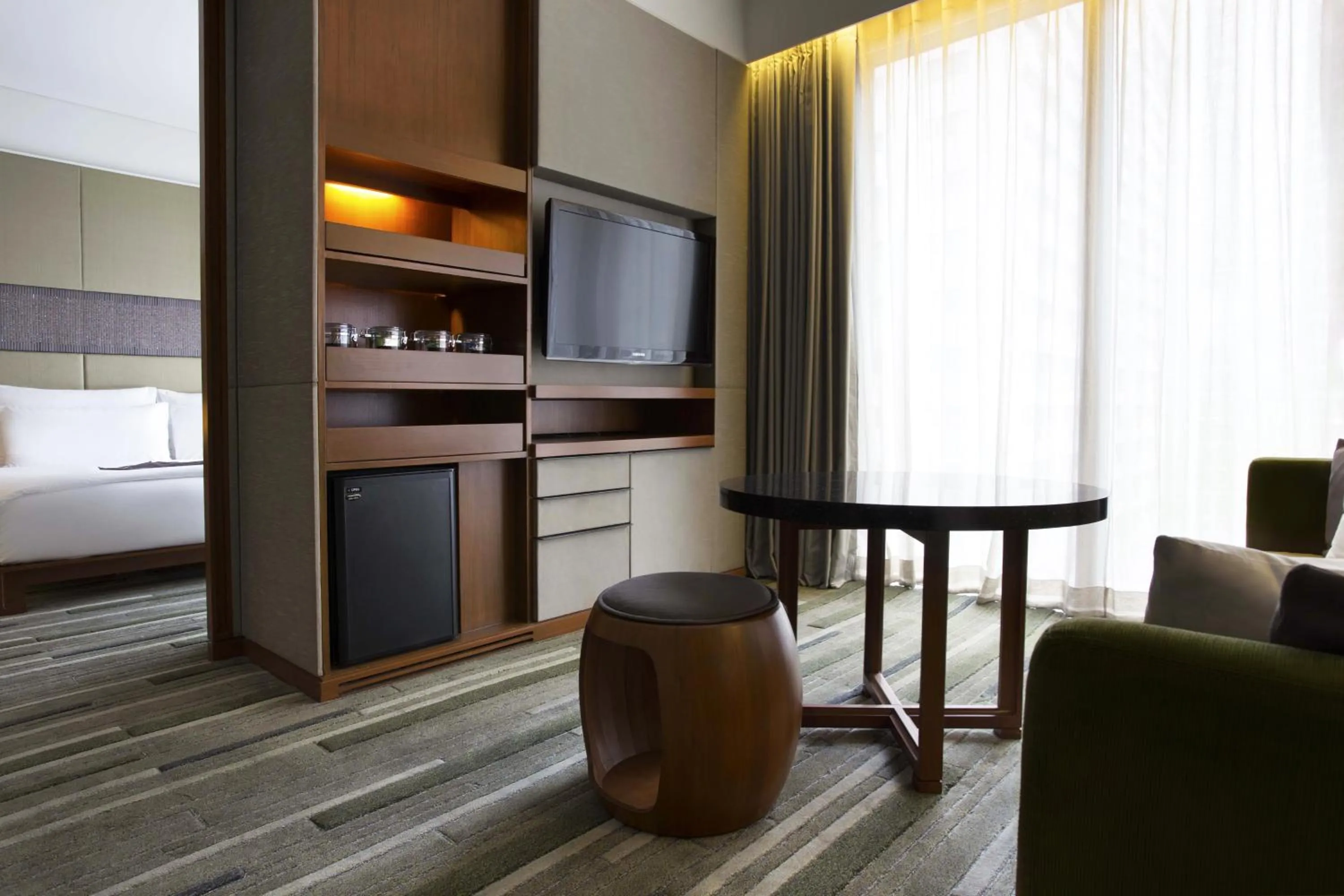 Living room, Bed in Hansar Bangkok Hotel