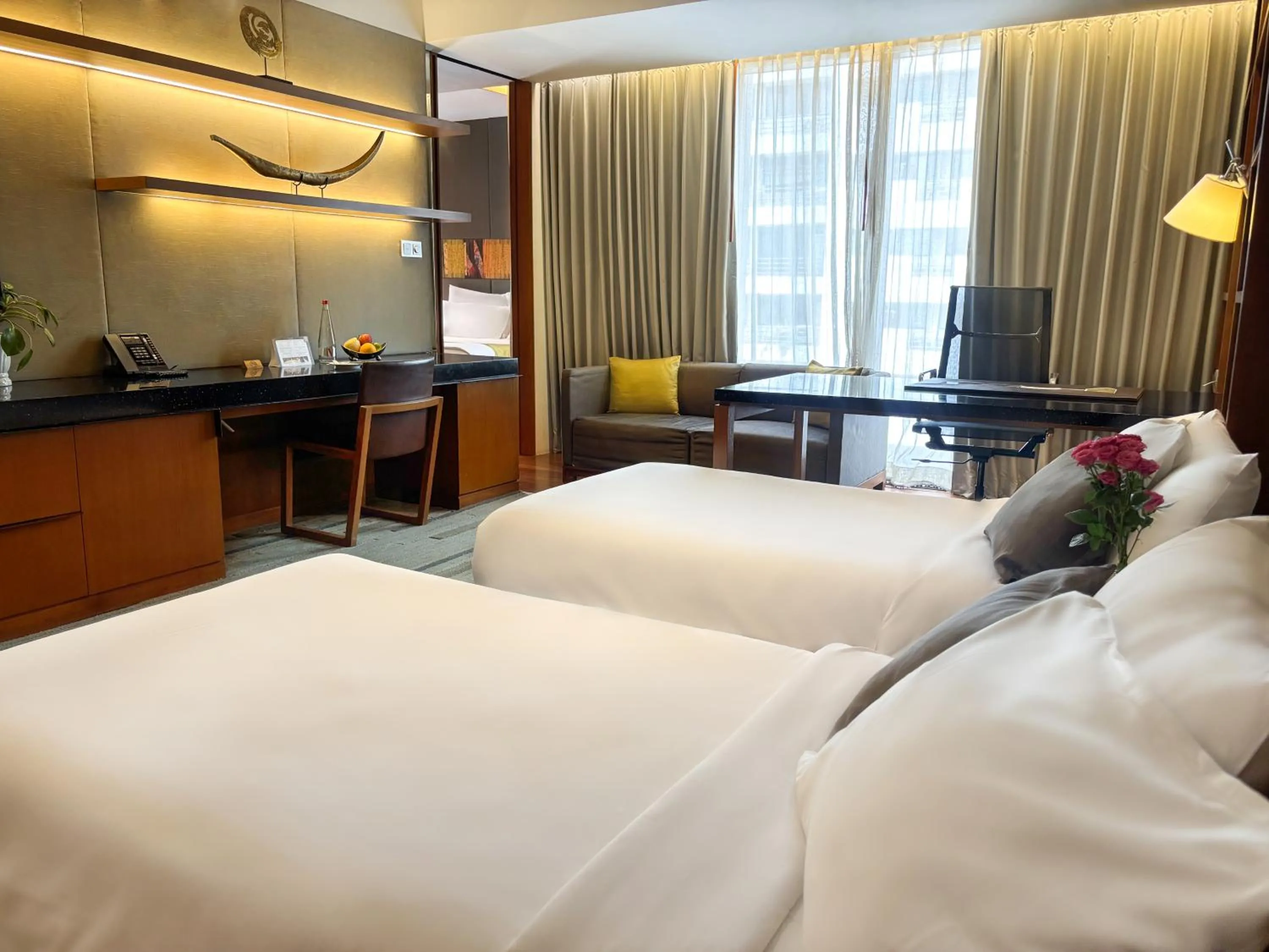 Bed in Hansar Bangkok Hotel