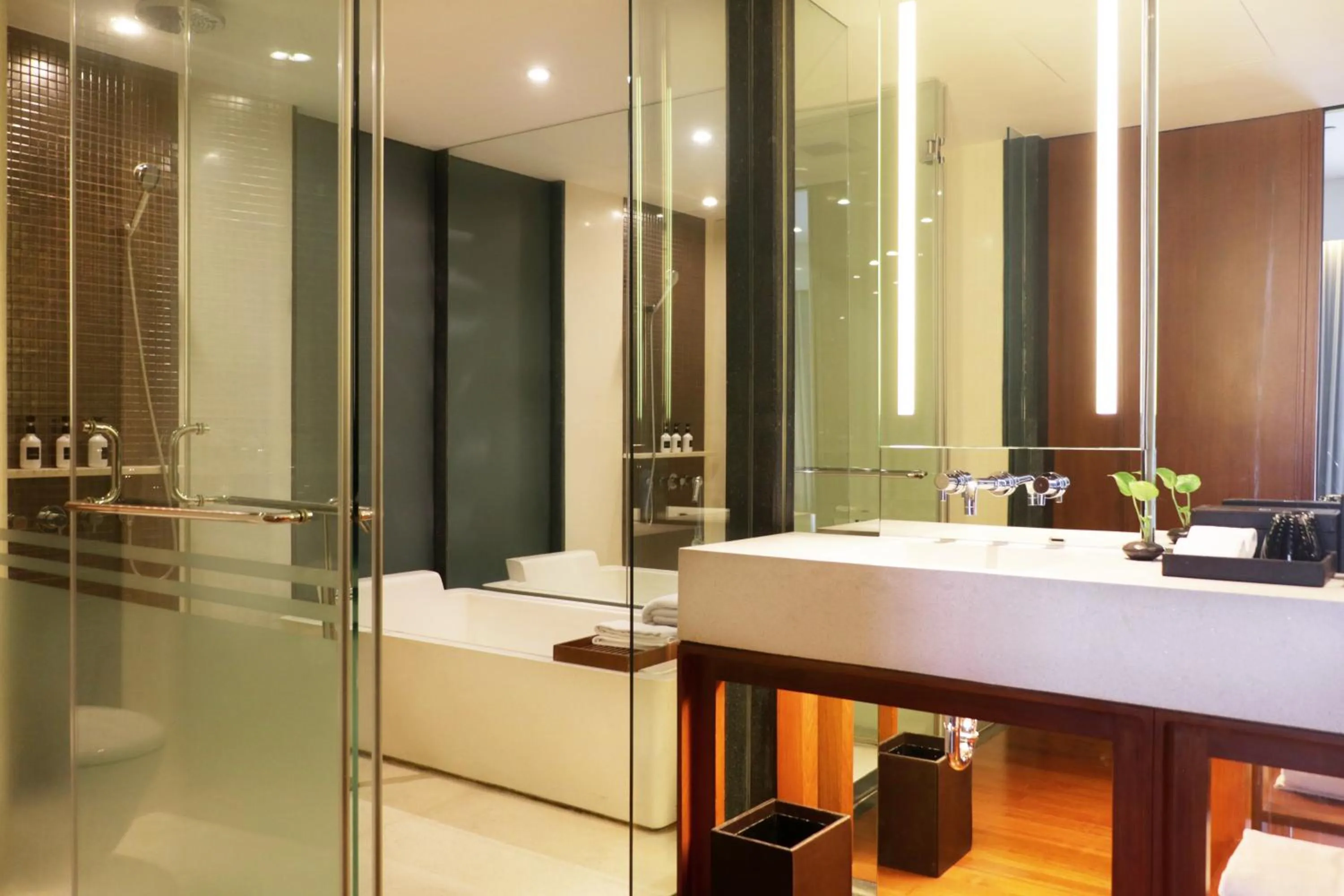 Bathroom in Hansar Bangkok Hotel