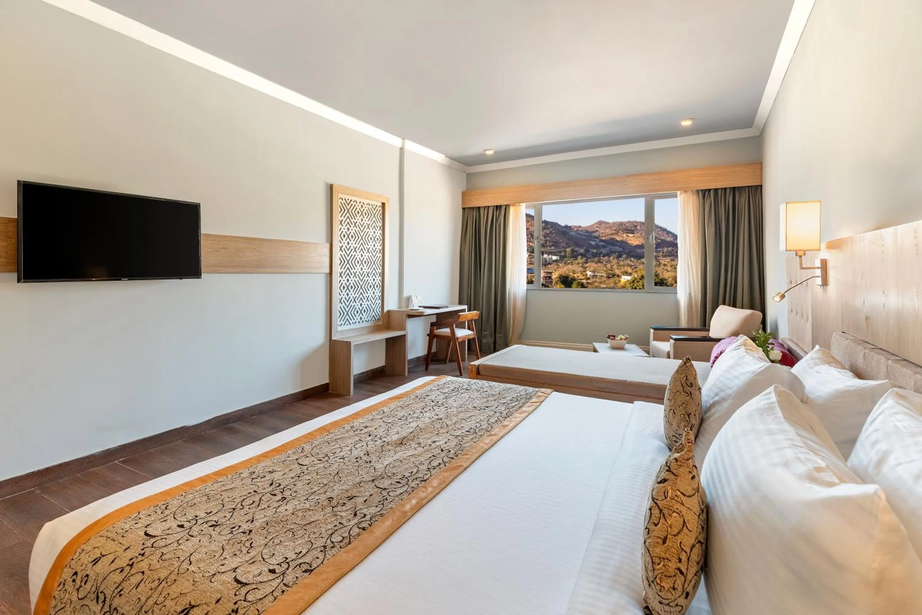 Bed in Via Lakhela Resort & Spa