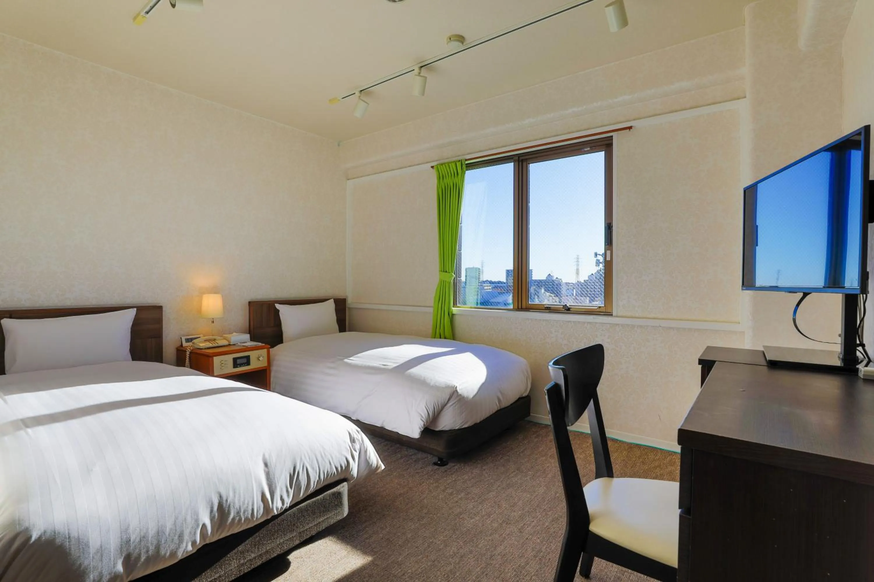 Bed in Hotel New Saitama