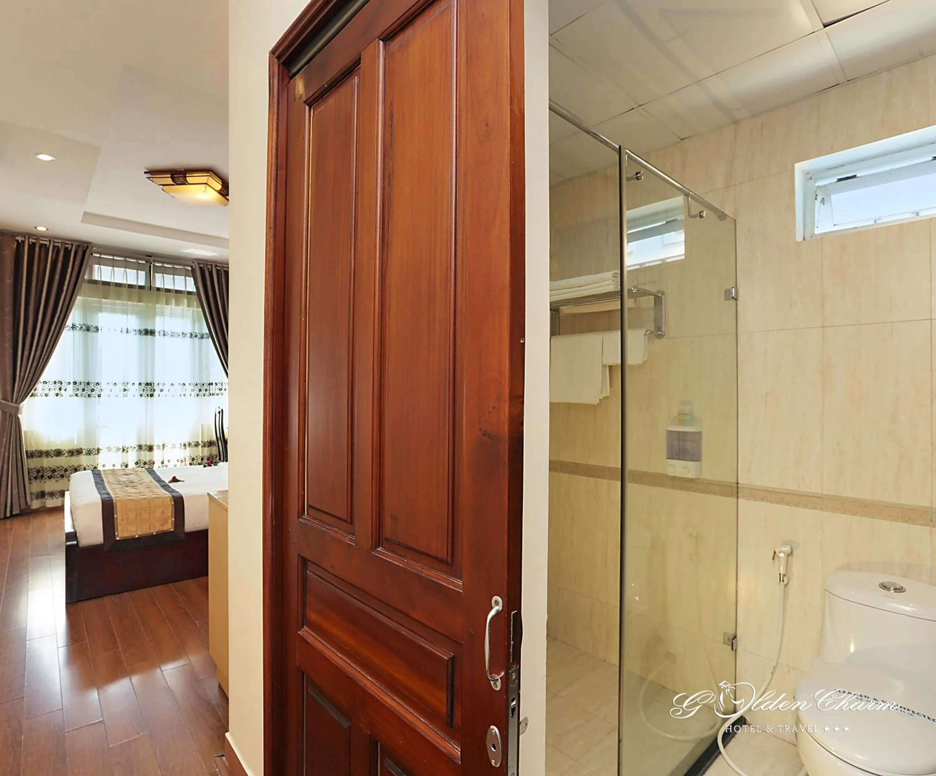 Bedroom in Hanoi Golden Charm Hotel