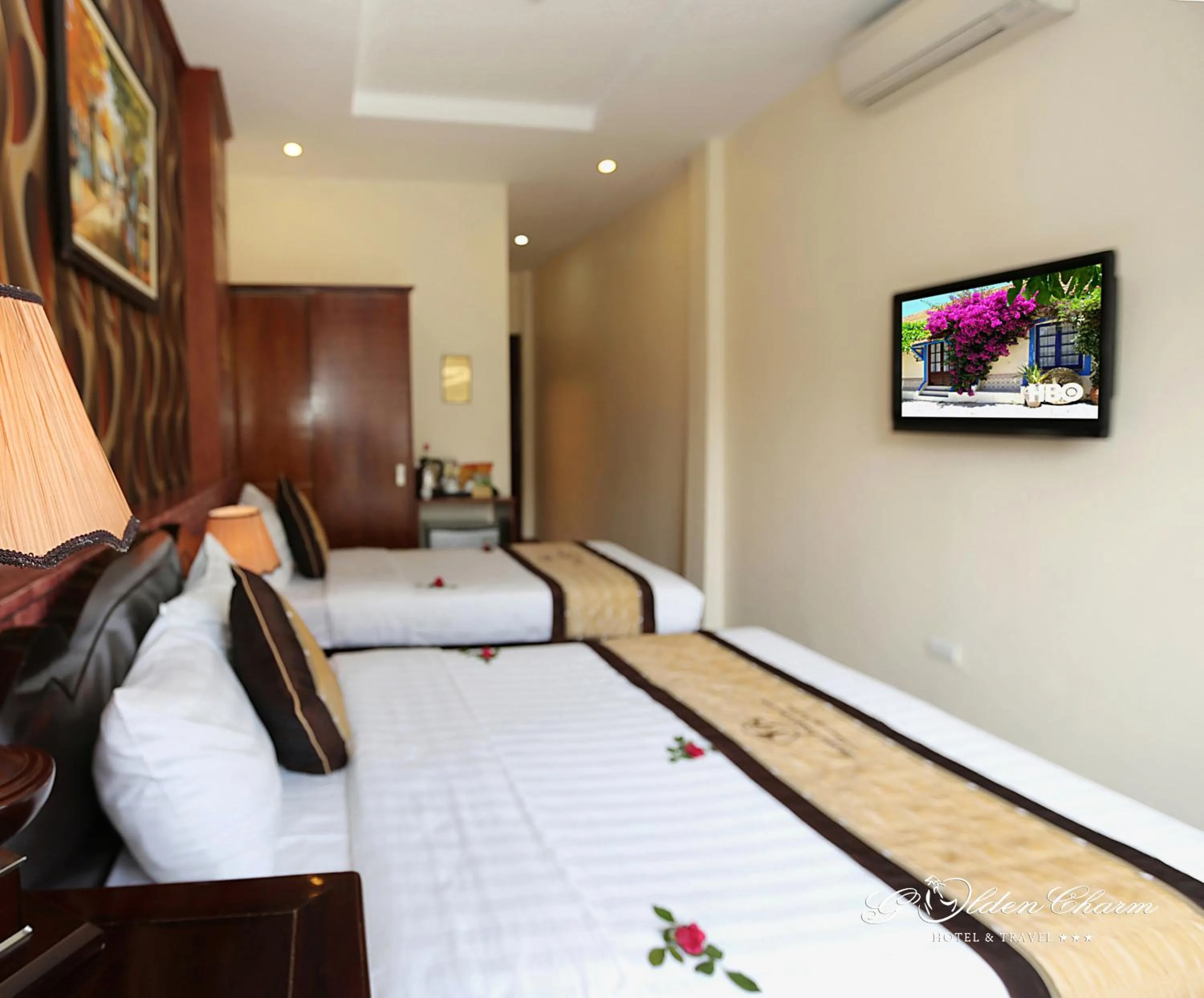 Bedroom in Hanoi Golden Charm Hotel