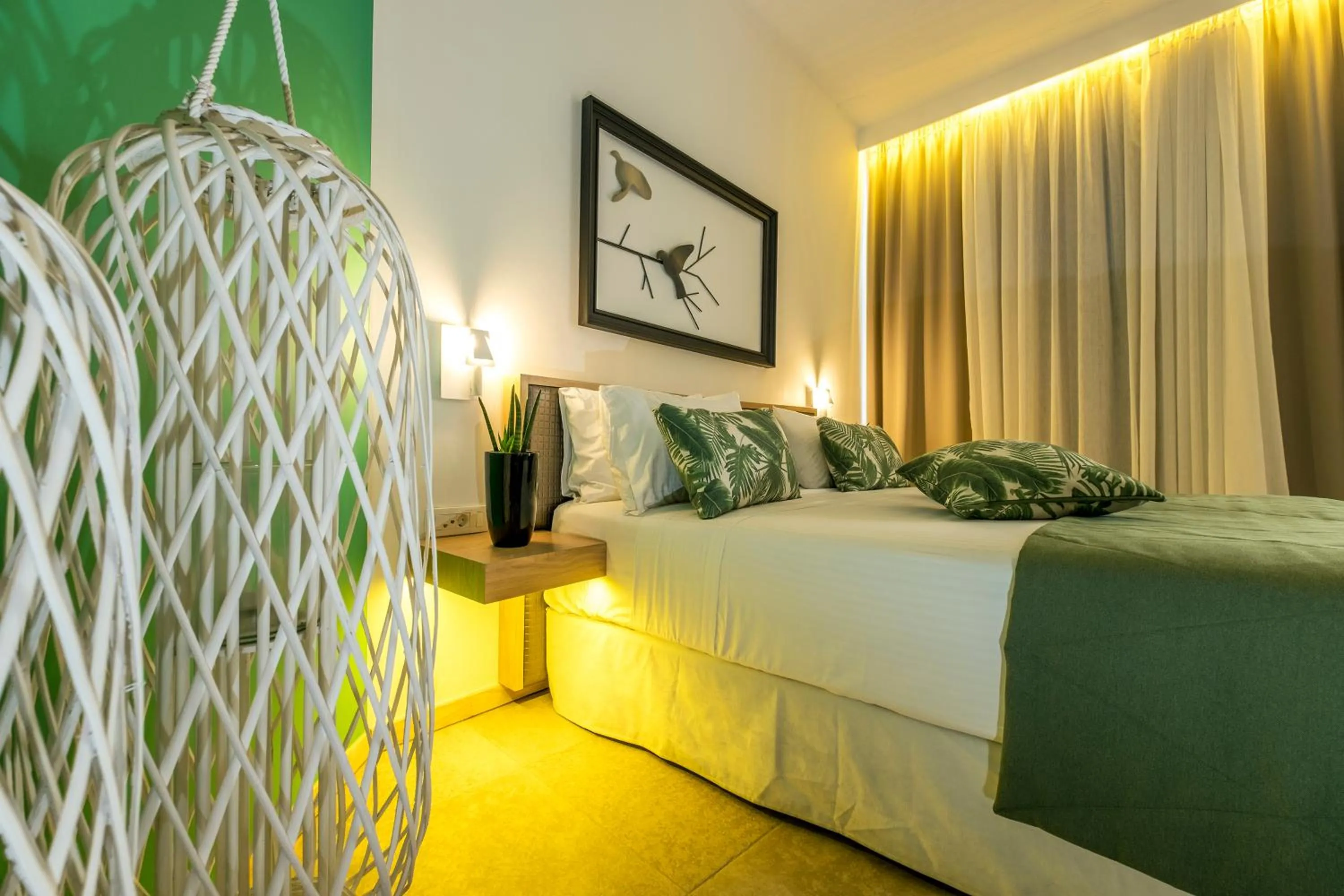 Quiet street view, Bed in Kalamaki Luxury Suites