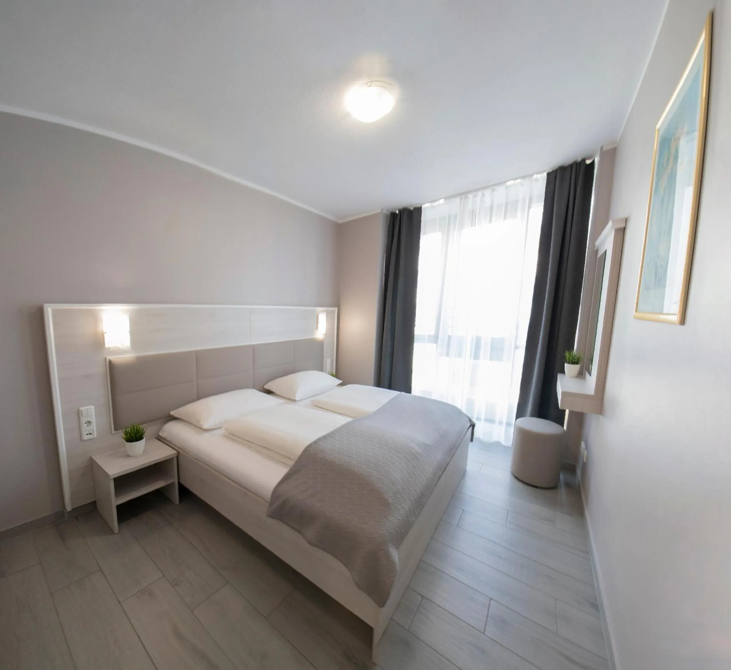 Bed in ARABEST Aparthotel & Boardinghouse