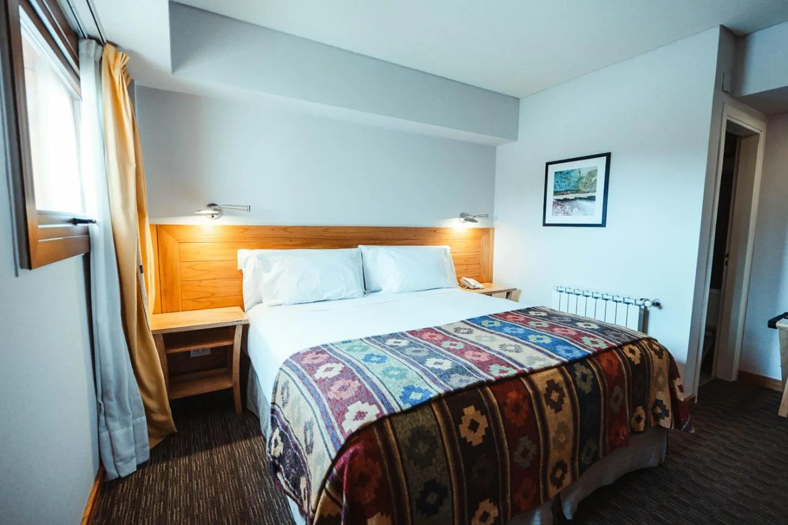 Photo of the whole room, Bed in Mirador del Lago Hotel