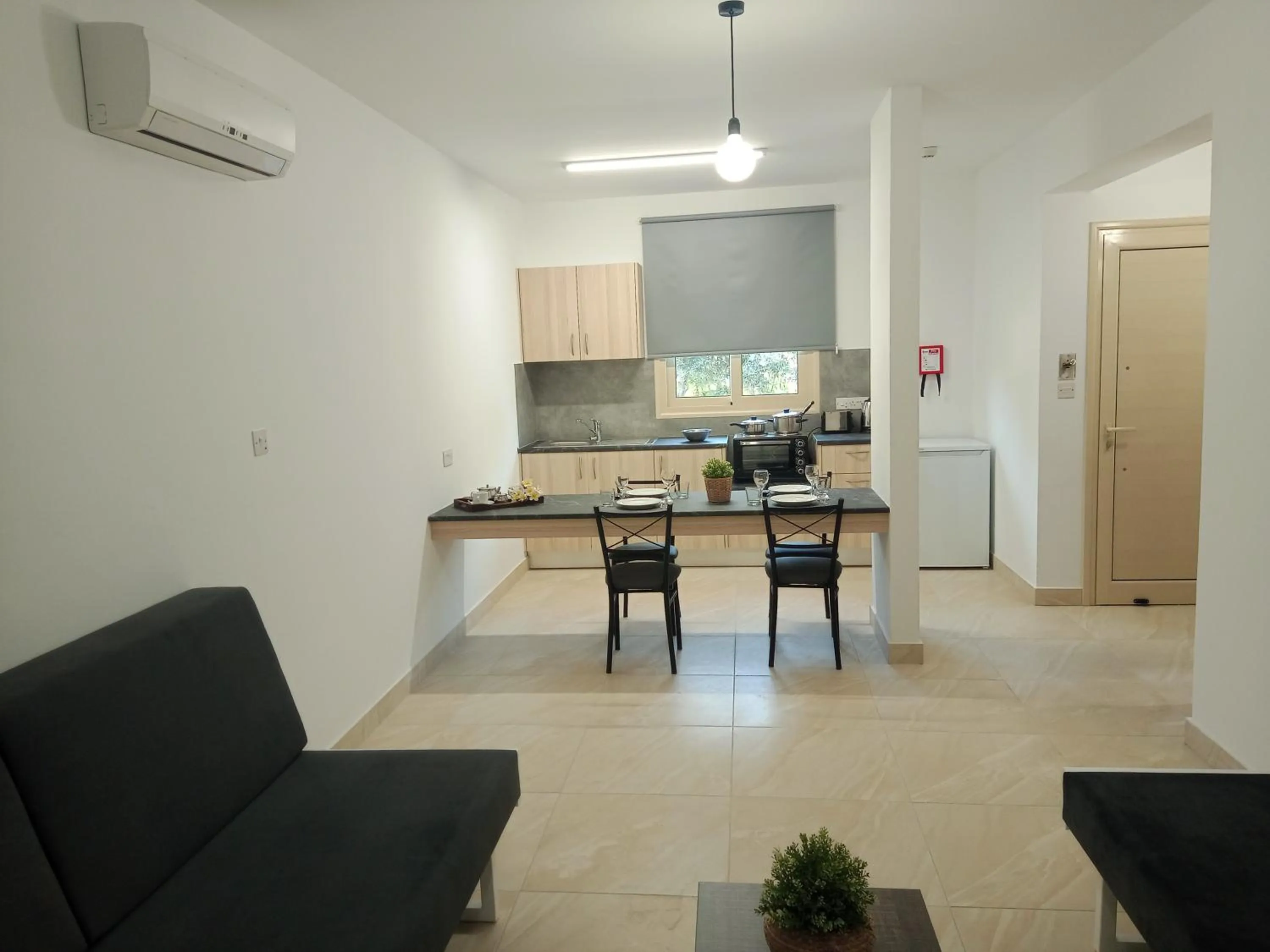Kitchen or kitchenette in Pagona Holiday Apartments