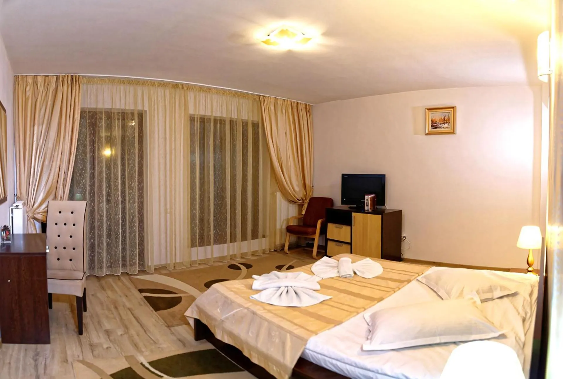 Photo of the whole room, Bed in Hotel boutique Garden Resort by Brancoveanu