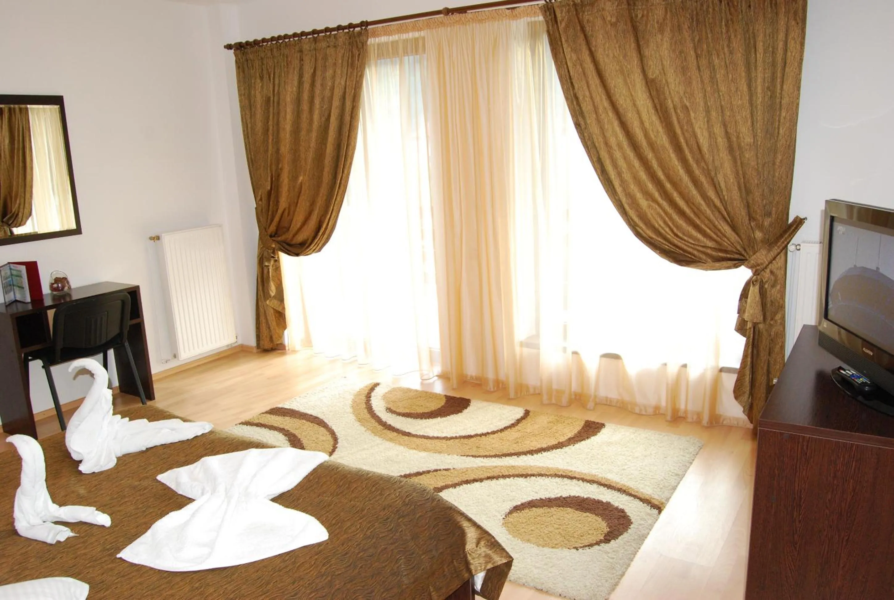 Bed in Hotel boutique Garden Resort by Brancoveanu