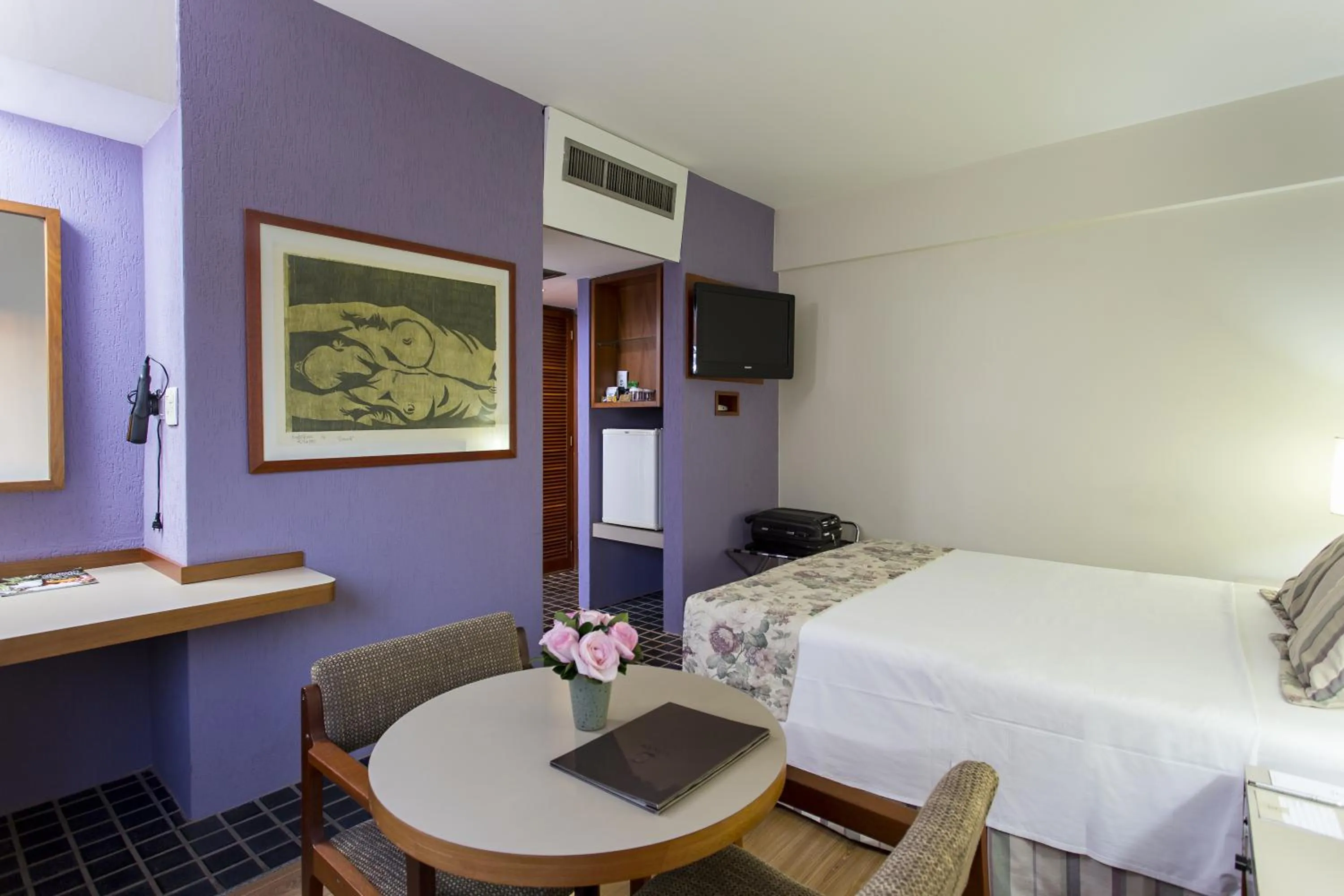 Bed in Black Stream Hotel