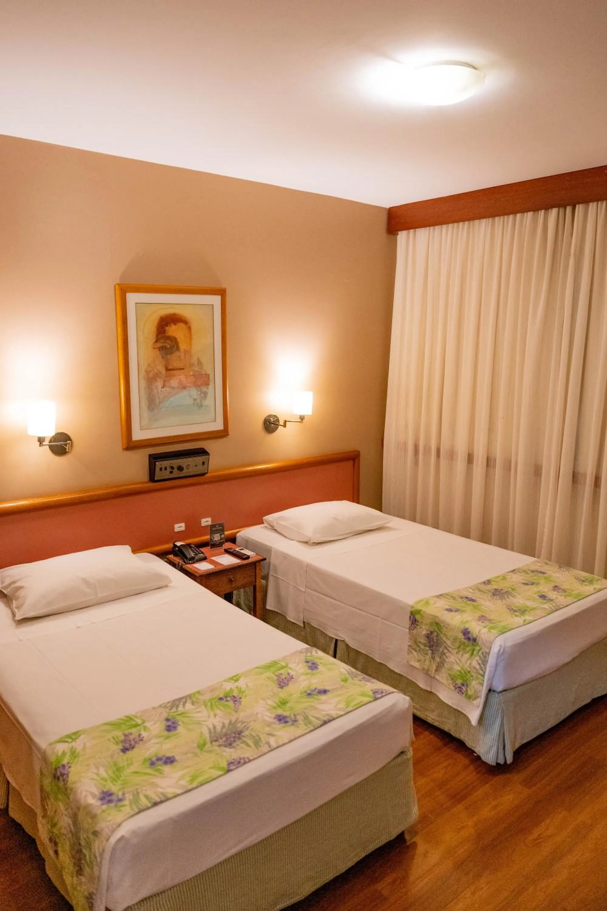 Bed in Black Stream Hotel