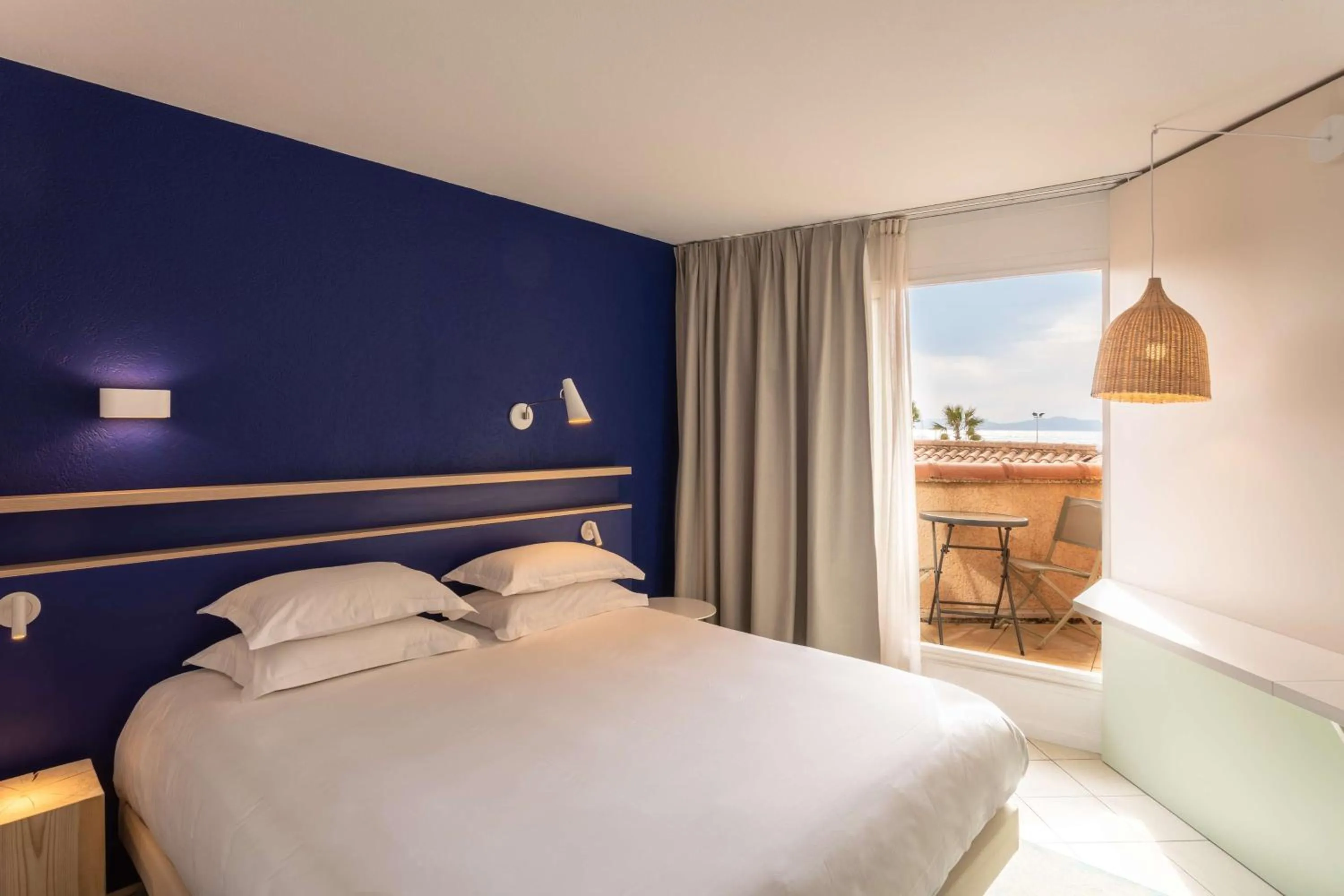 Balcony/Terrace, Bed in Hotel Paradou Mediterranee, BW Signature Collection by Best Western