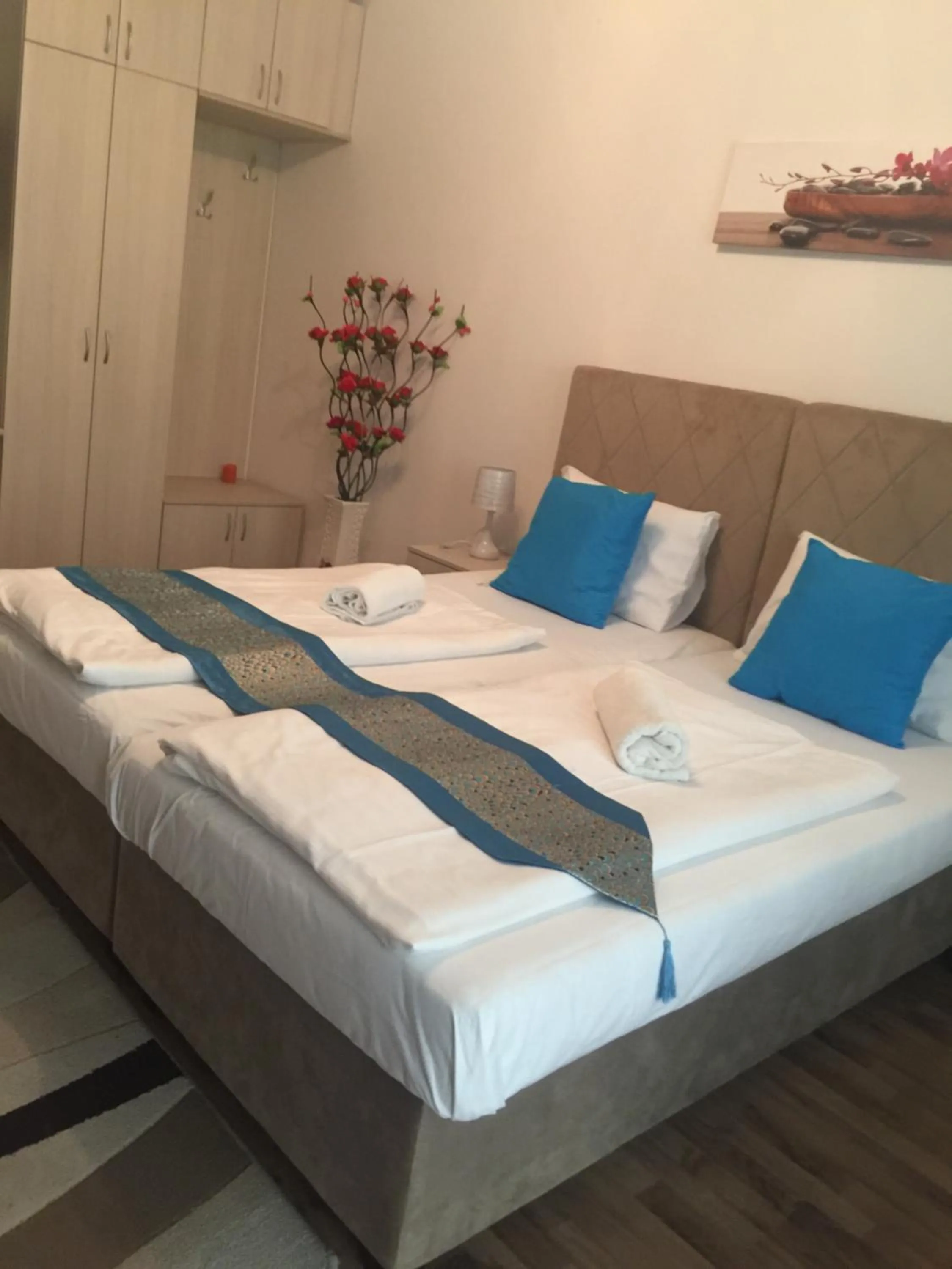 Bed in Corvin Rose Apartment Hotel