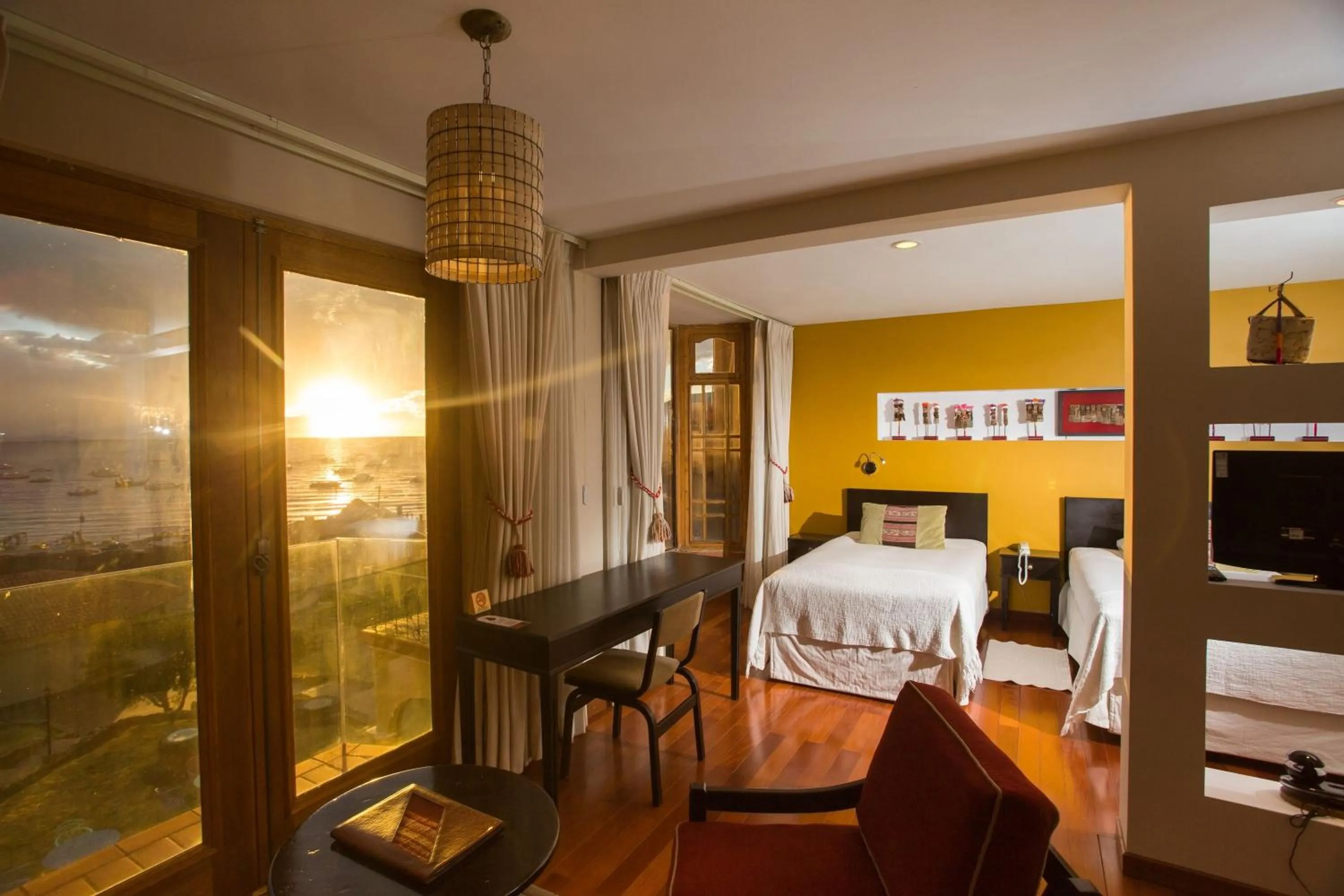 Living room, Bed in Hotel Rosario Lago Titicaca