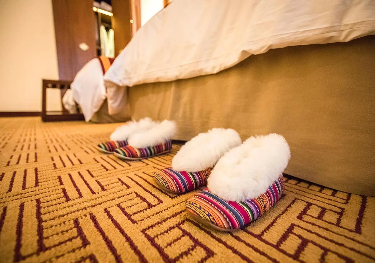 Bed in Sumaq Machu Picchu Hotel