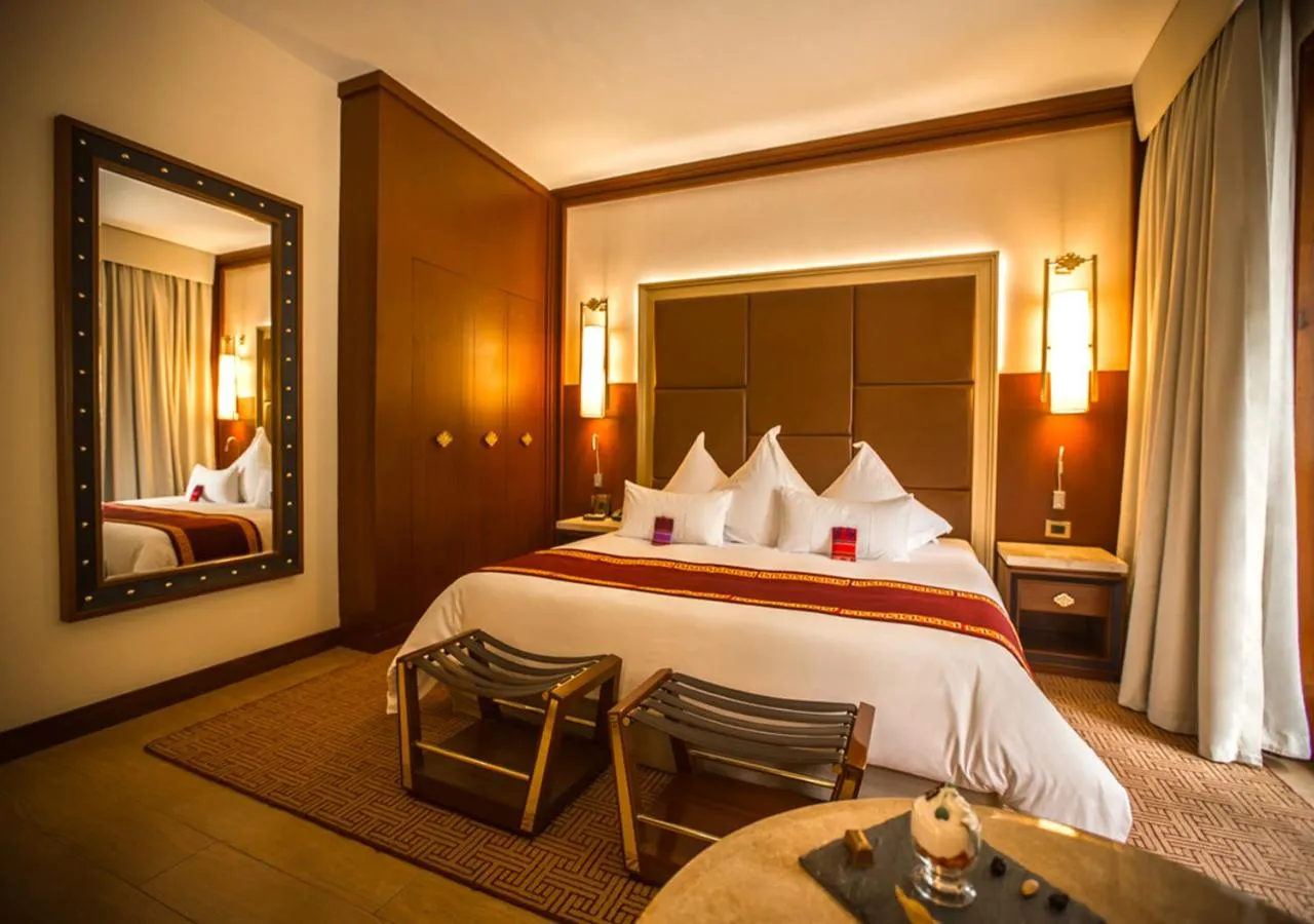 Bed in Sumaq Machu Picchu Hotel