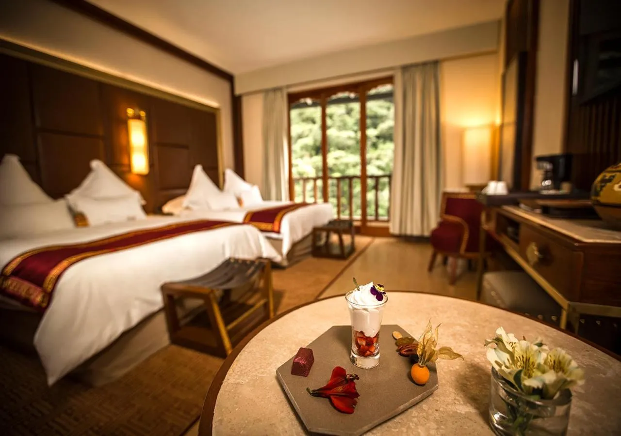 Photo of the whole room, Bed in Sumaq Machu Picchu Hotel