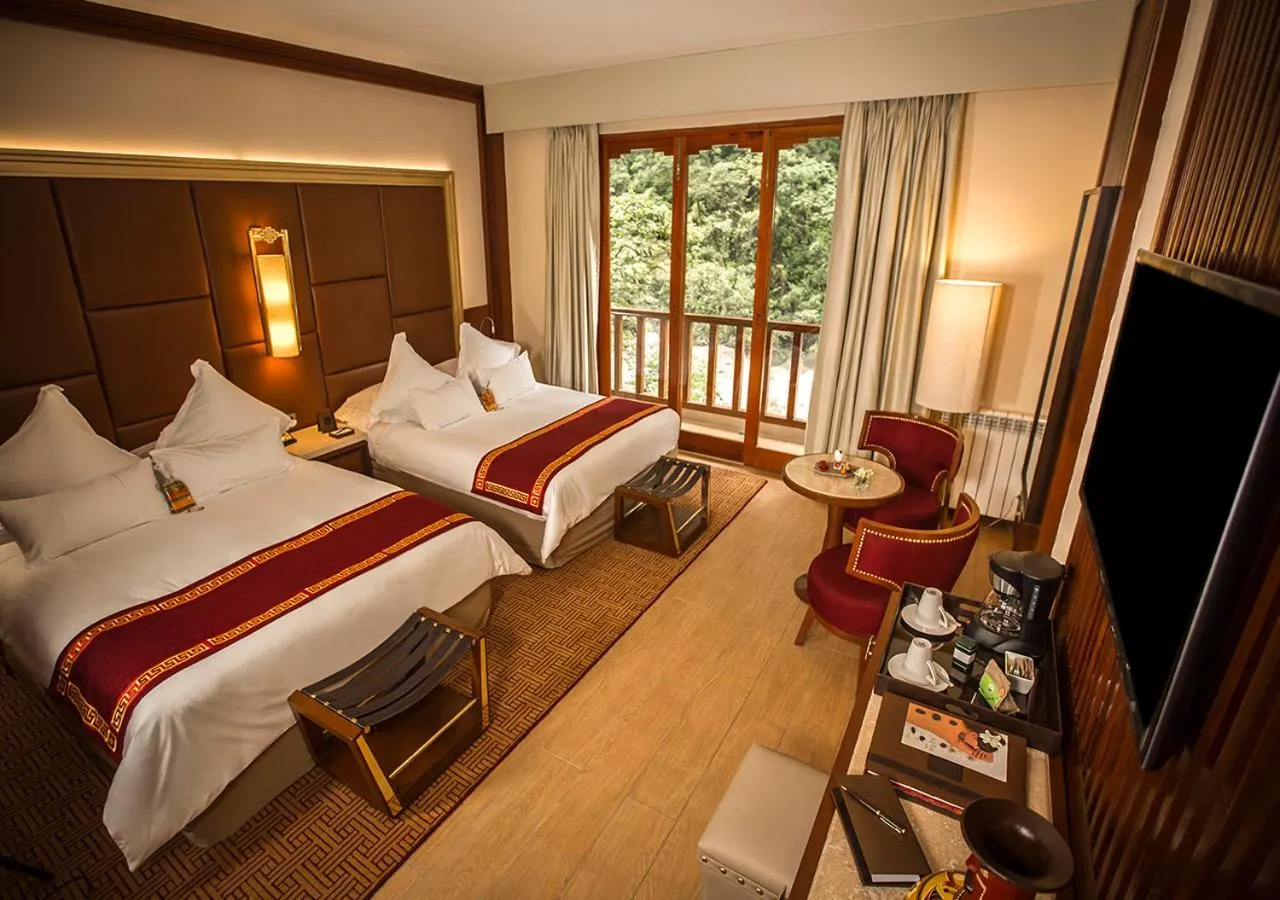 Photo of the whole room, Bed in Sumaq Machu Picchu Hotel