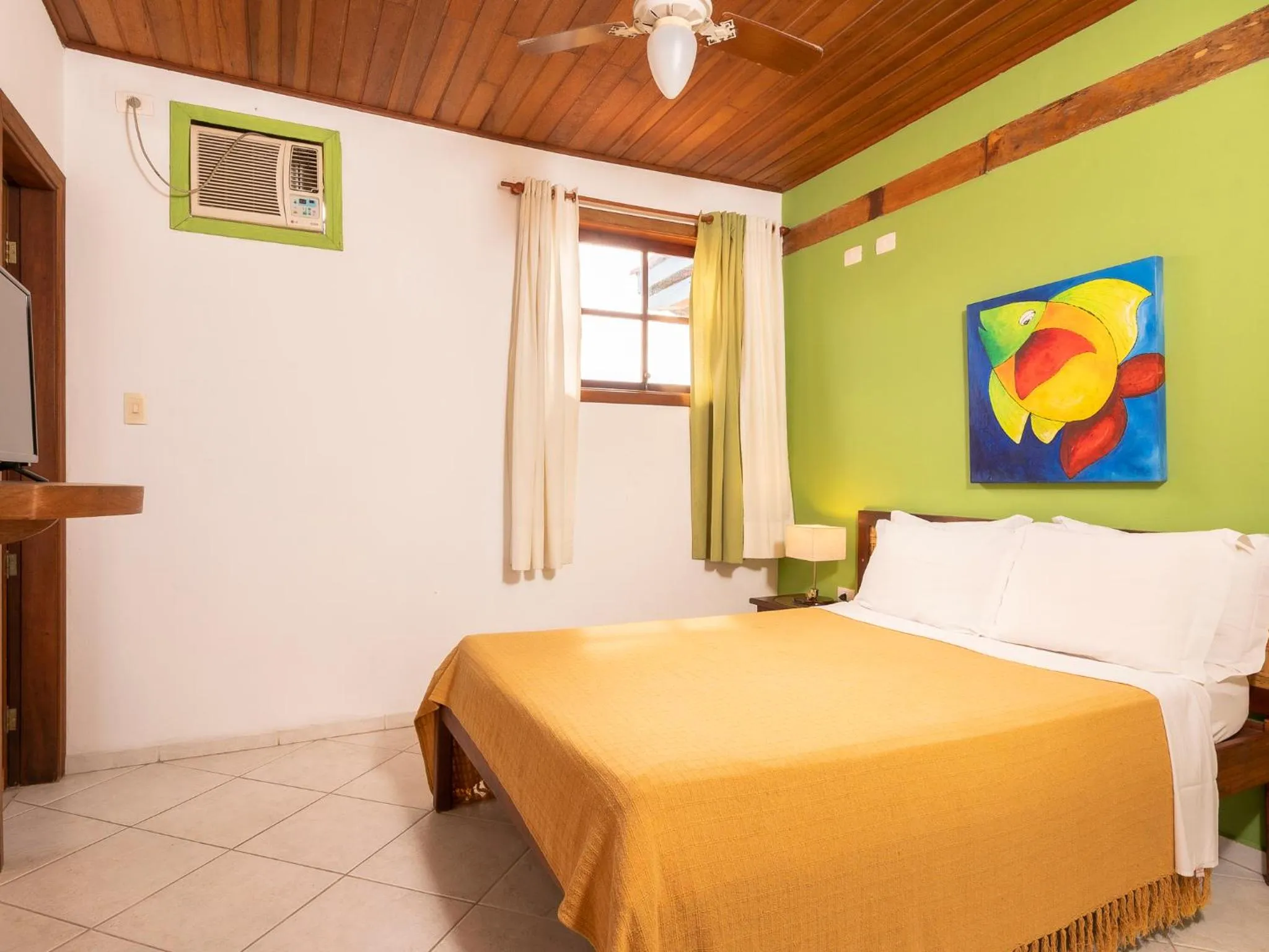 Bed in Pousada Atiaia