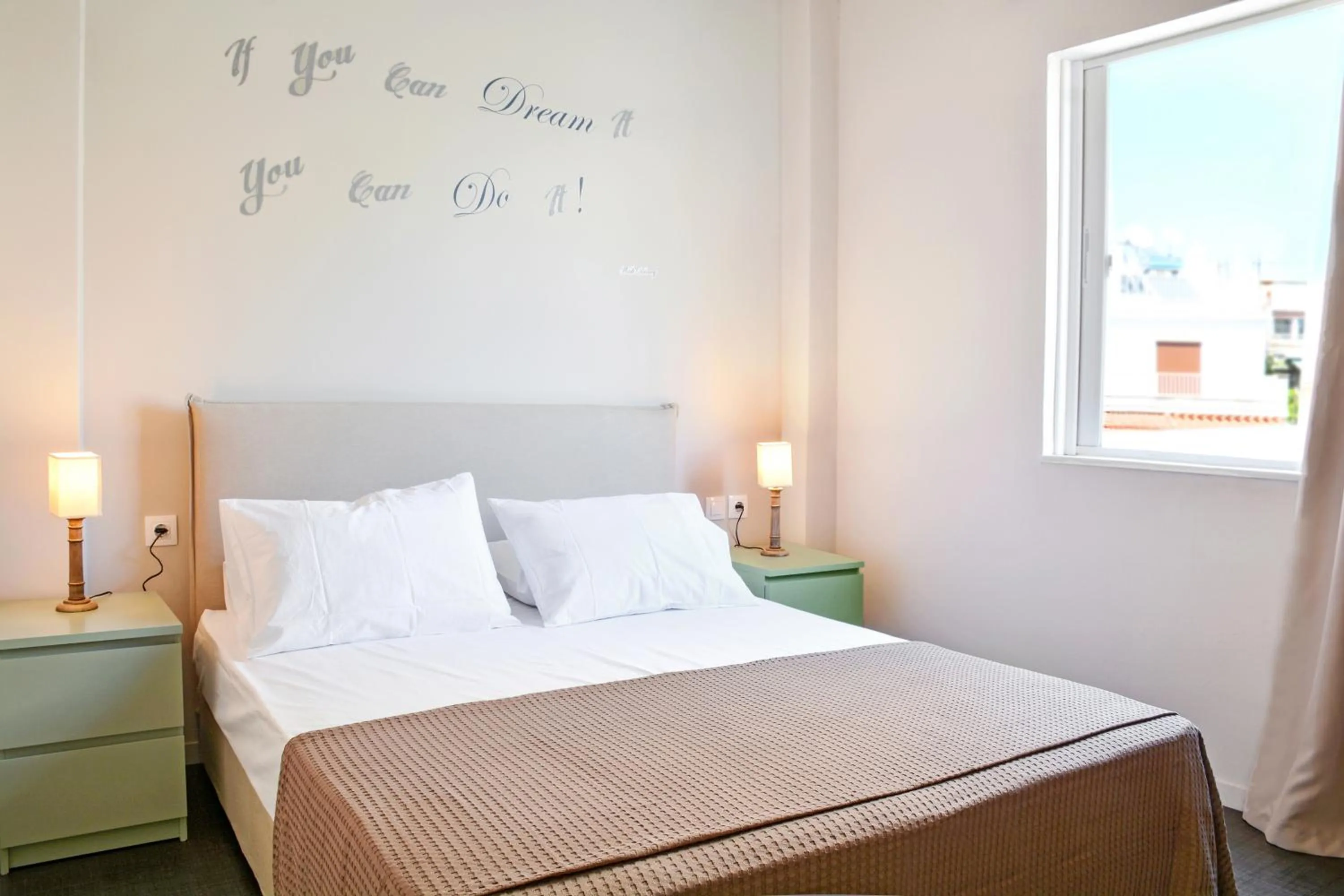 Bed in Athens Connection Apartments