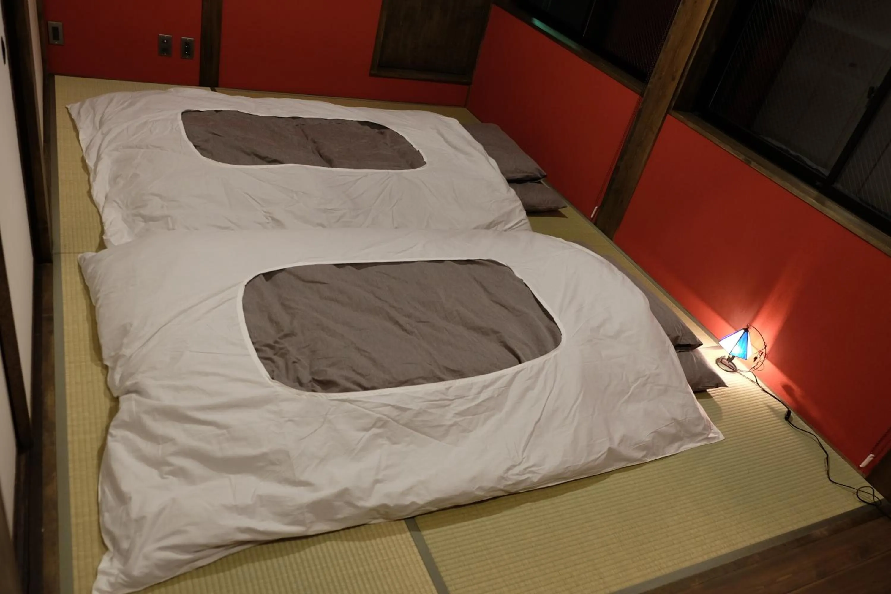 Bed in Teramachiya Wind Bell Temple Guest House