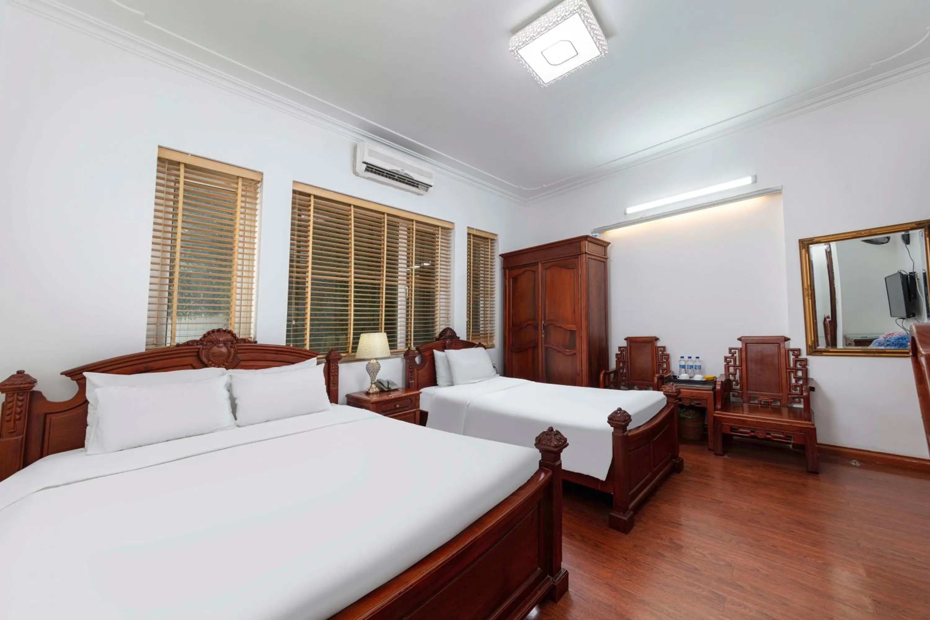 Bed in Phoenix Palace Hotel Hanoi