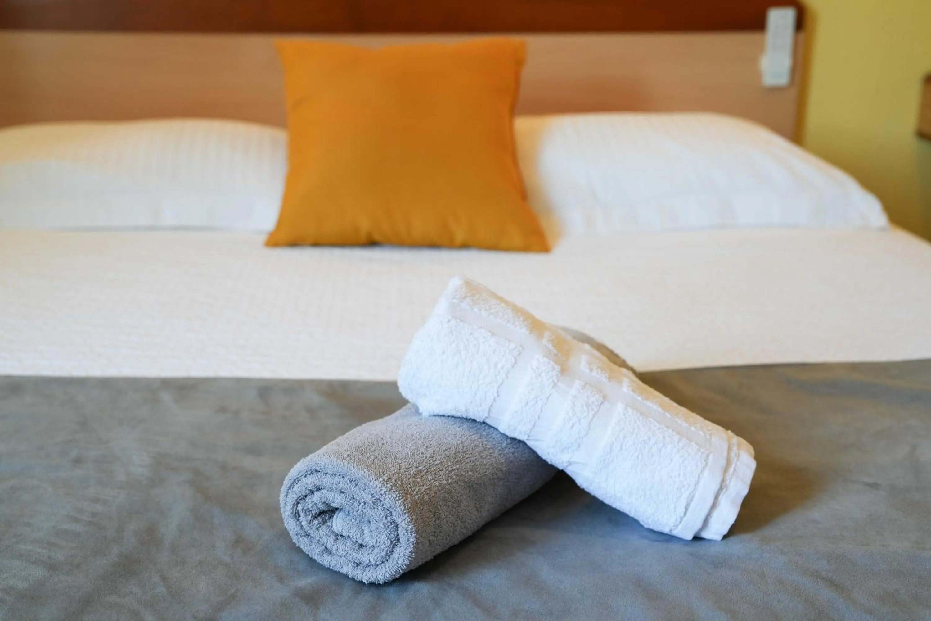 Bed in Logis Hôtel La crémaillère