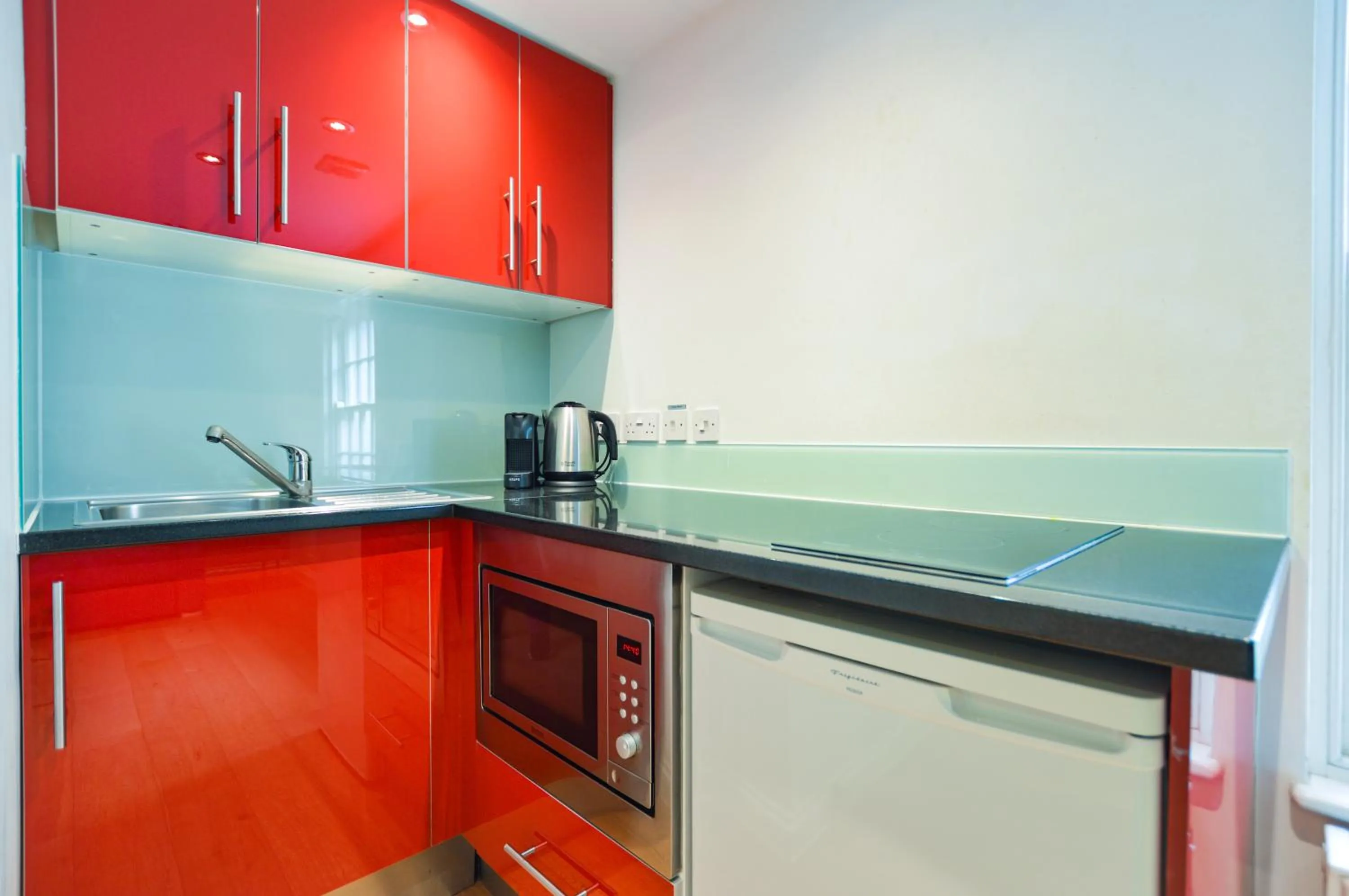 Kitchen or kitchenette in Paddington Green Serviced Apartments by Concept Apartments