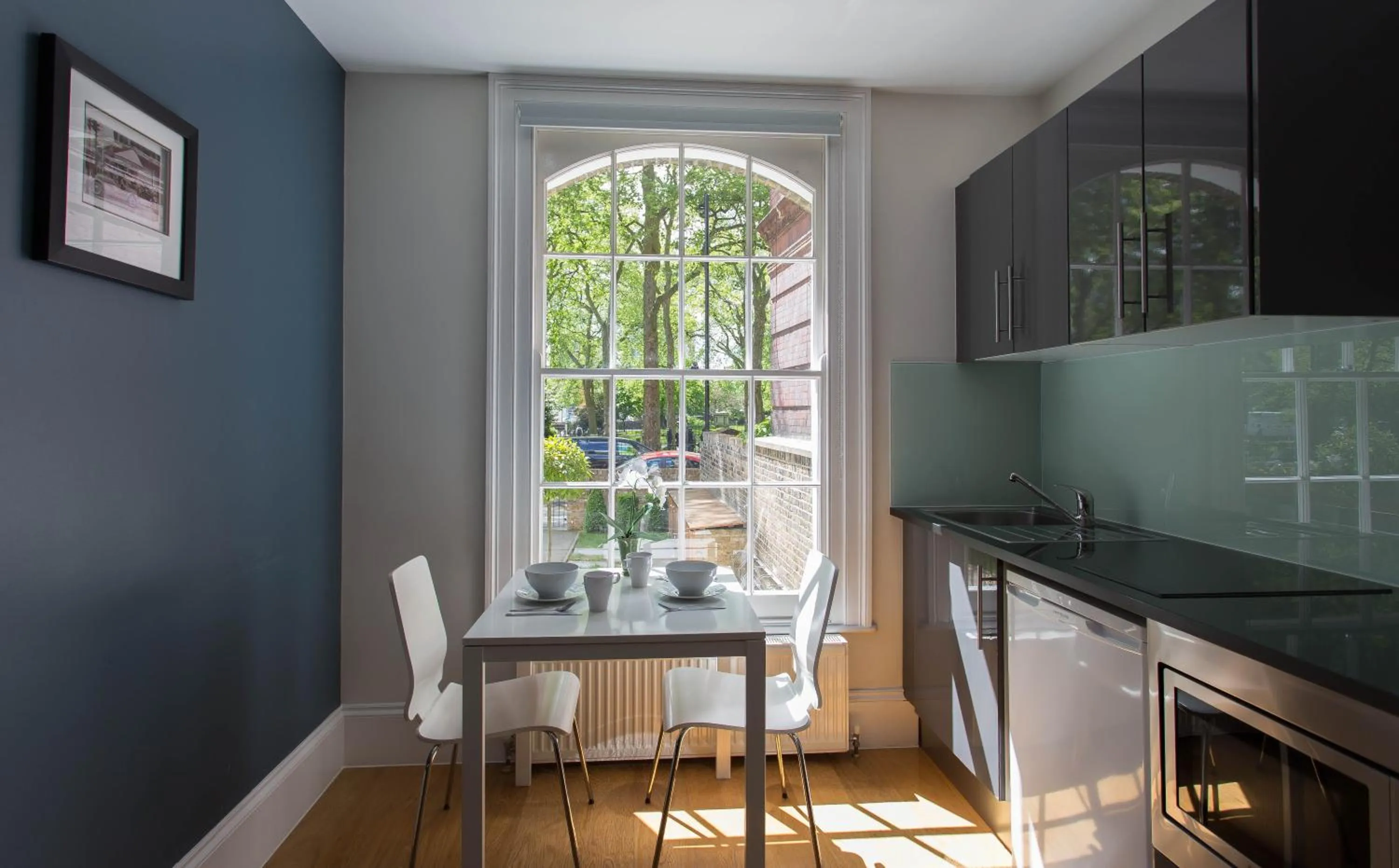 Dining area in Paddington Green Serviced Apartments by Concept Apartments