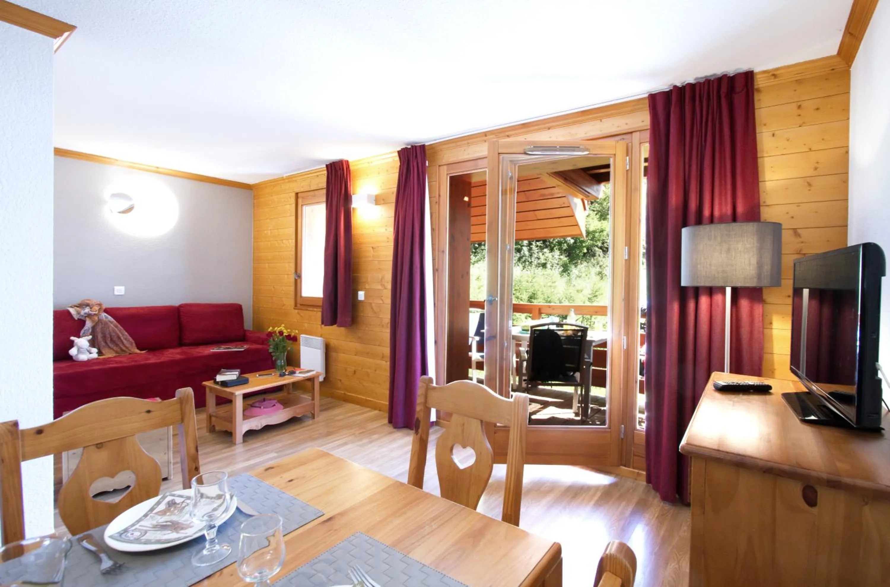 Seating area in Résidence Odalys Le Hameau et les Chalets de la Vallée d'Or