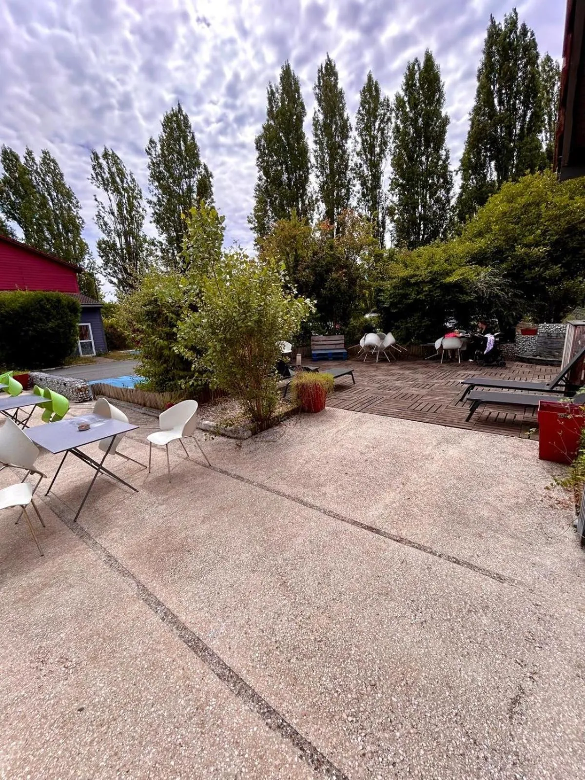 Seating area in Enzo Hotels Trappes by Kyriad Direct