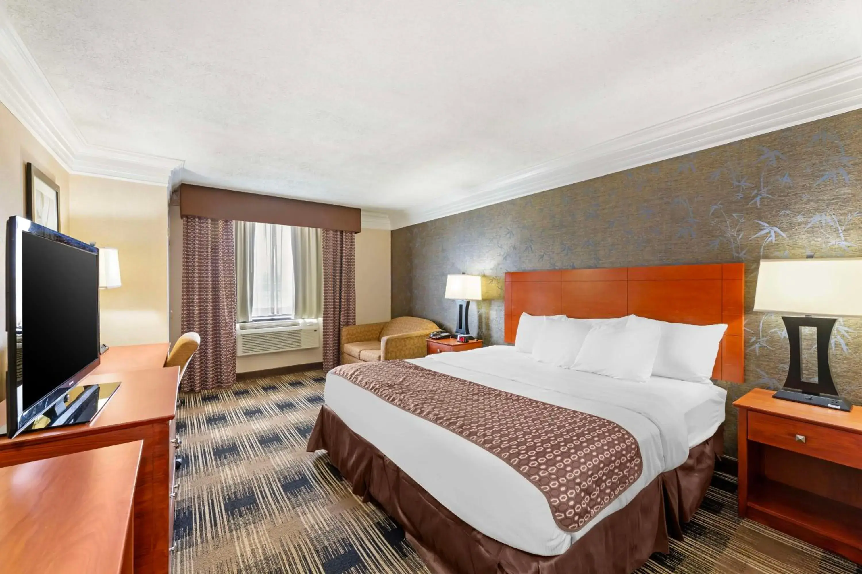 Executive King Room with Sofa Bed and Living Room - Non-Smoking in Best Western Inn at the Rochester Airport Executive King Room with Sofa Bed and Living Room - Non-Smoking in Best Western Inn at the Rochester Airport