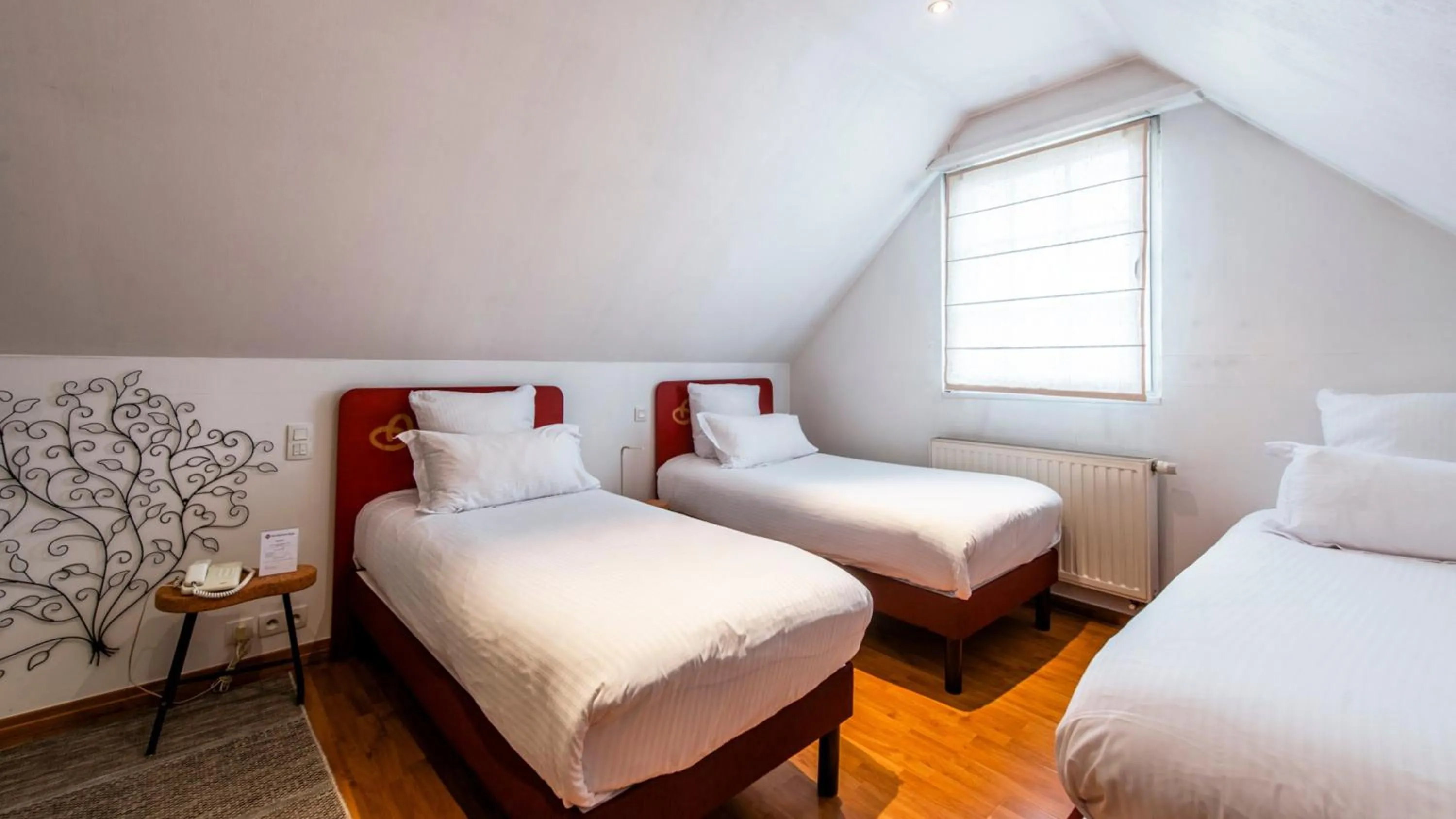 Bed in Best Western Plus Au cheval Blanc à Mulhouse