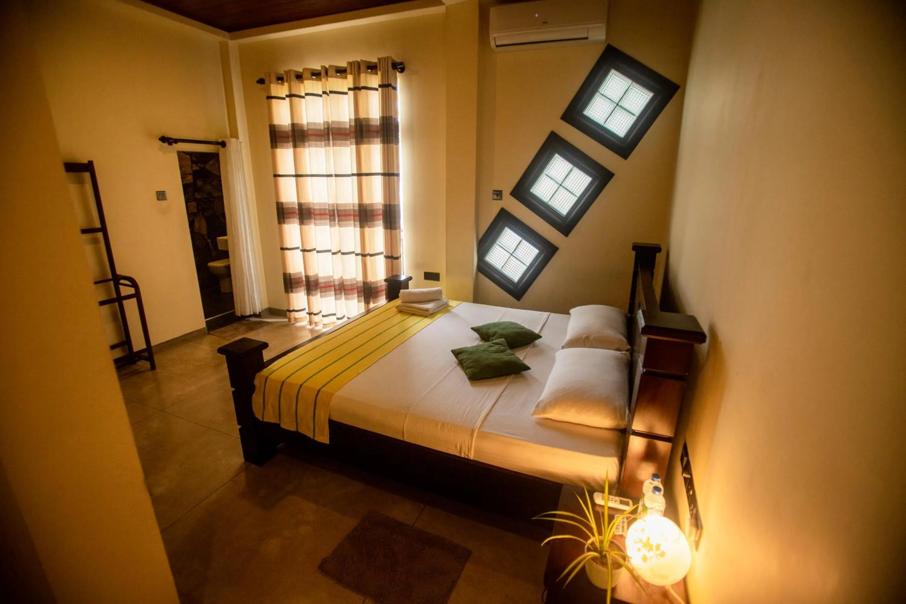 Bed in Evergreen Hotel Dambulla