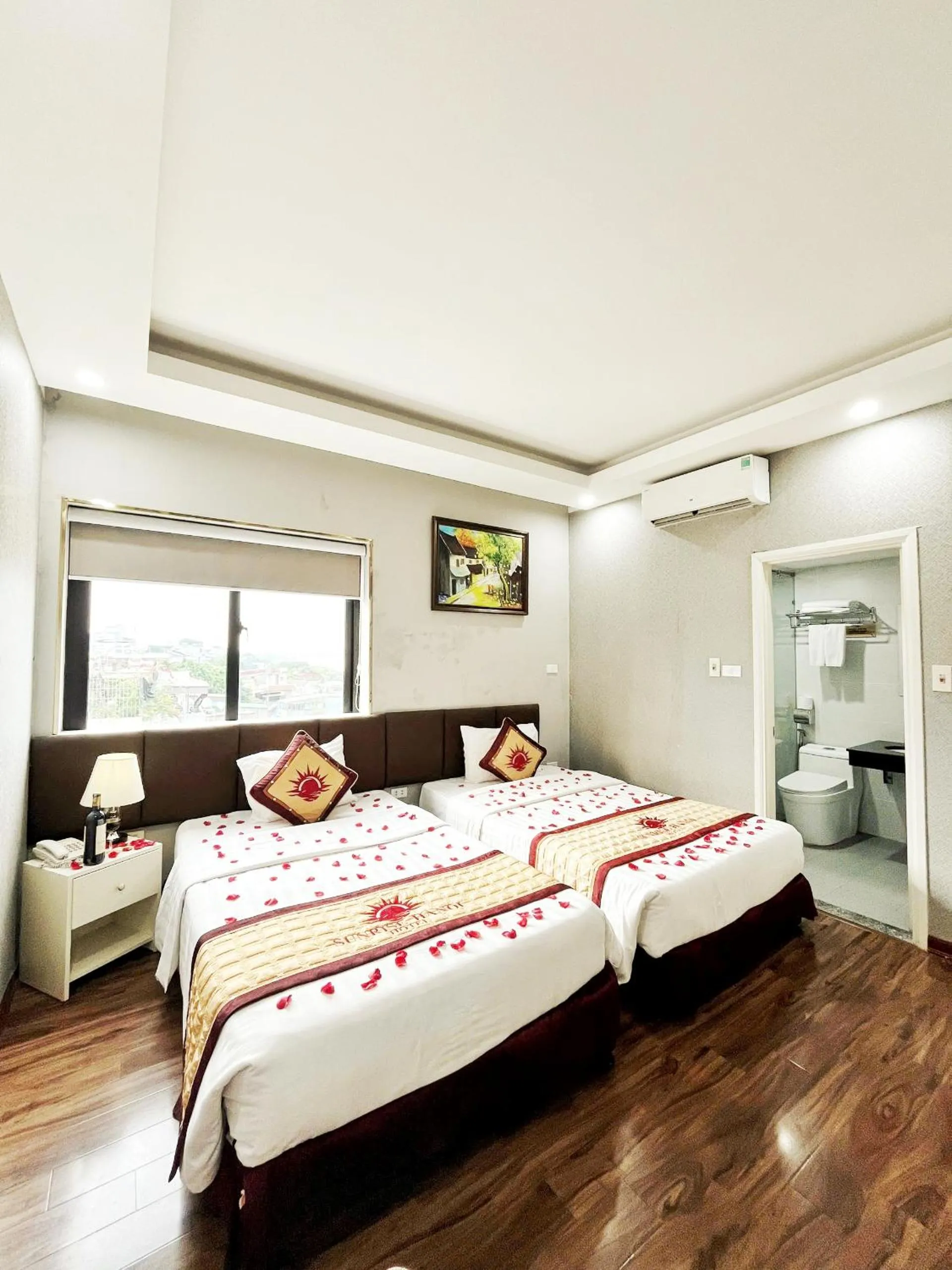 Bed in Sunrise Hanoi Hotel