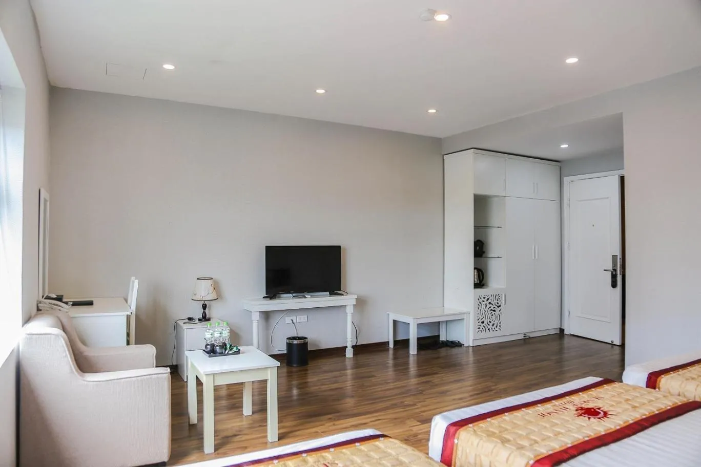 Communal lounge/ TV room in Sunrise Hanoi Hotel