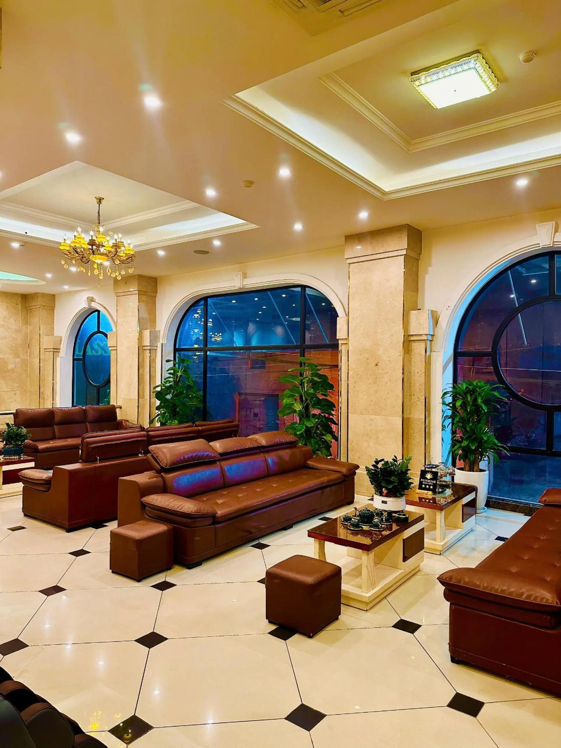 Communal lounge/ TV room in Sunrise Hanoi Hotel