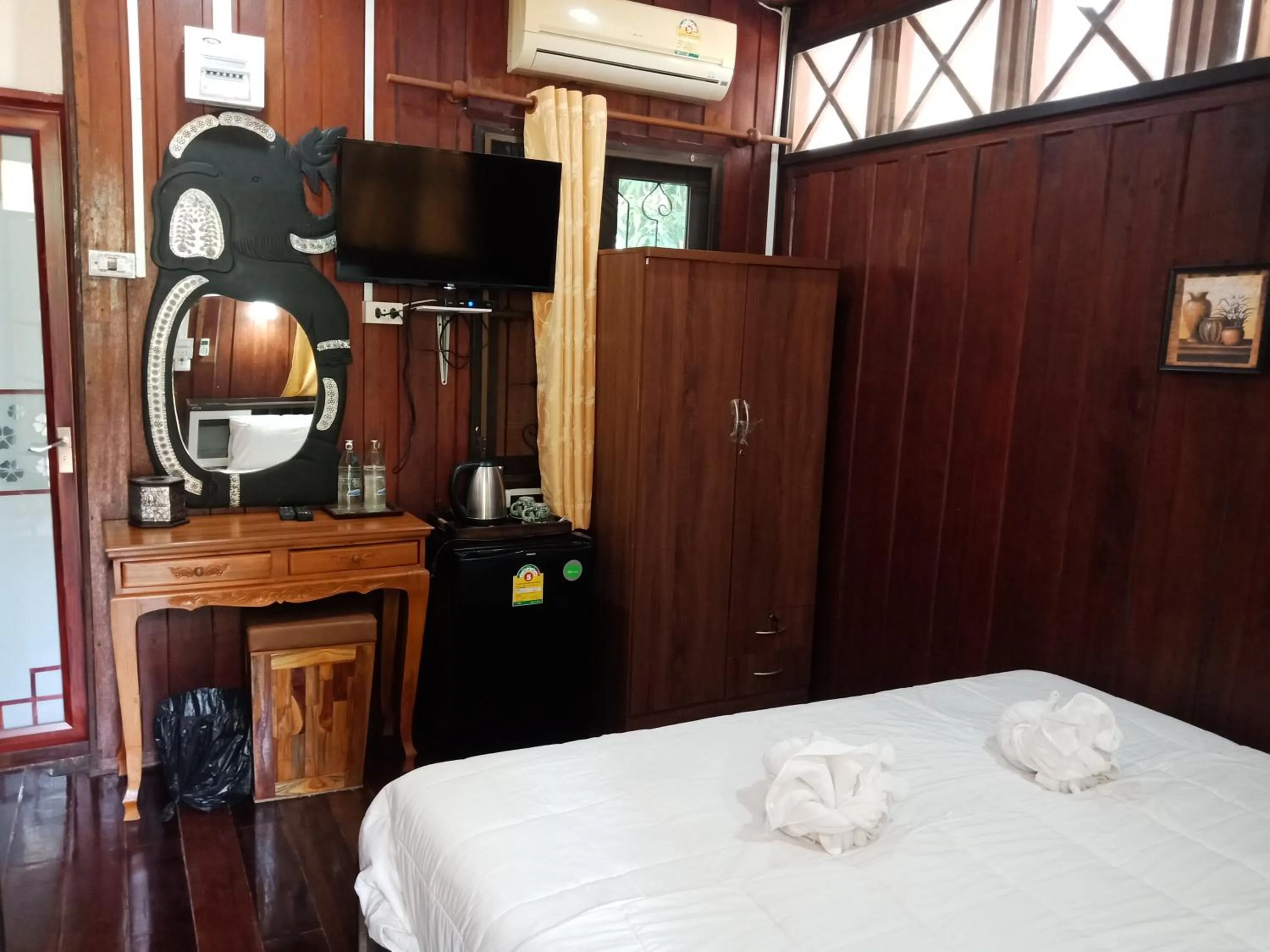 Bed in Sisatchanalai Heritage Resort