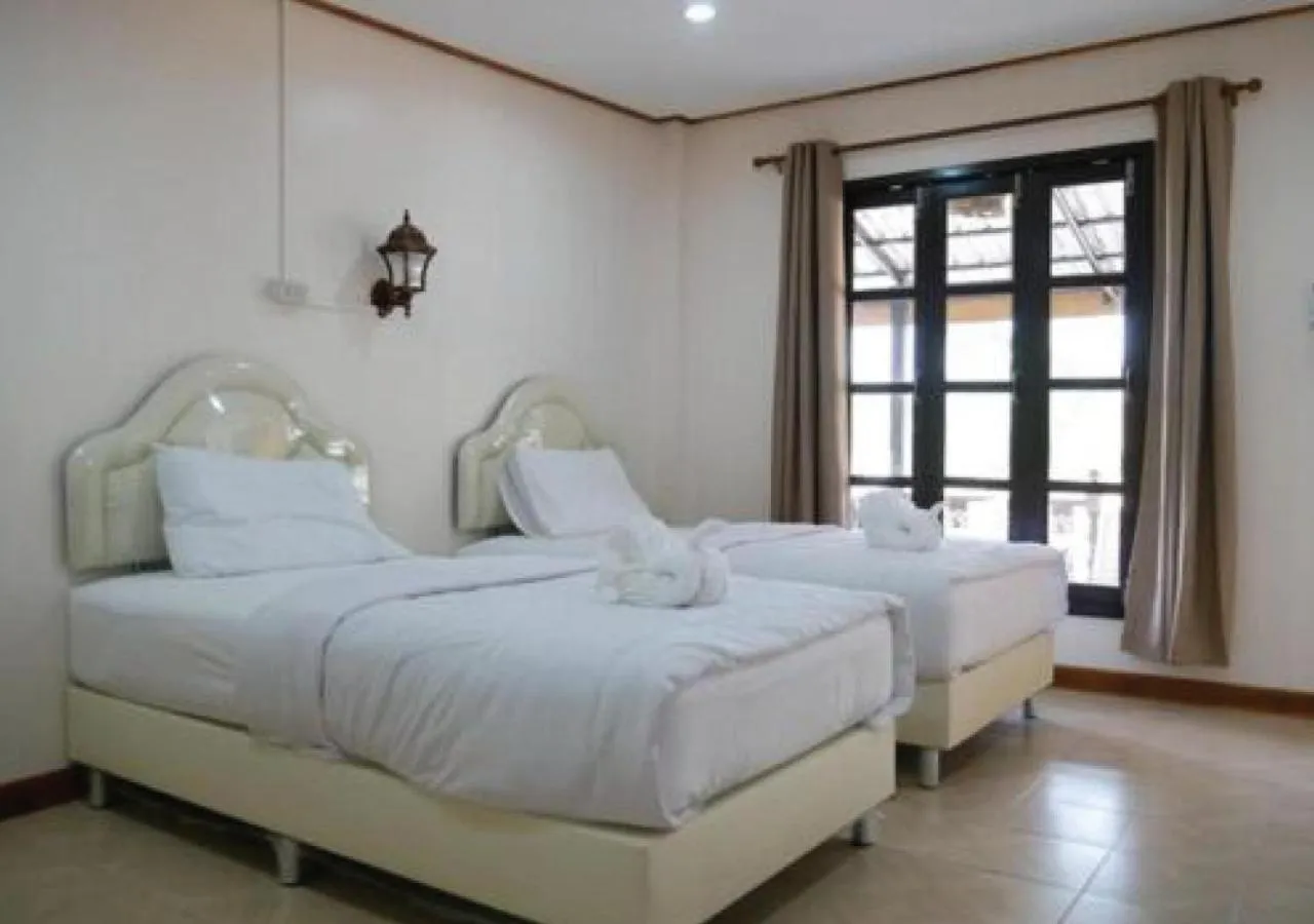 Bed in Sisatchanalai Heritage Resort